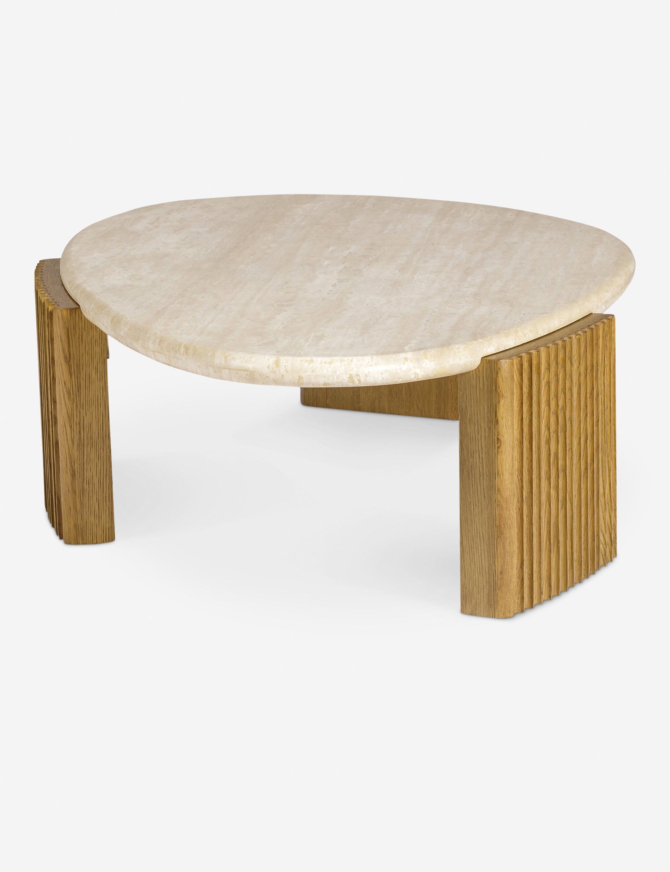 Angled overhead view of the Rayan travertine top and fluted leg coffee table