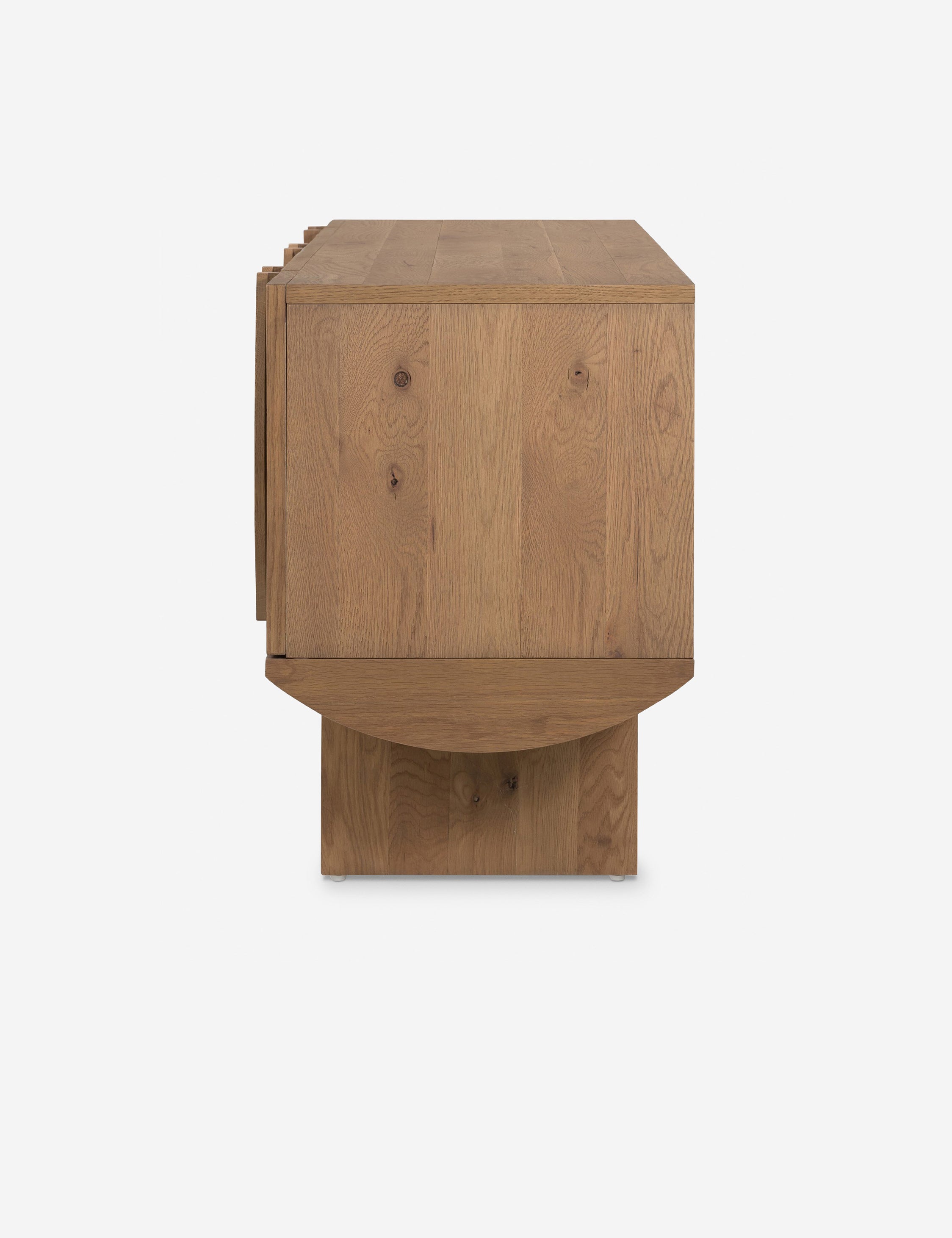 Side view of the Remwald sculptural oak wood low profile media console.