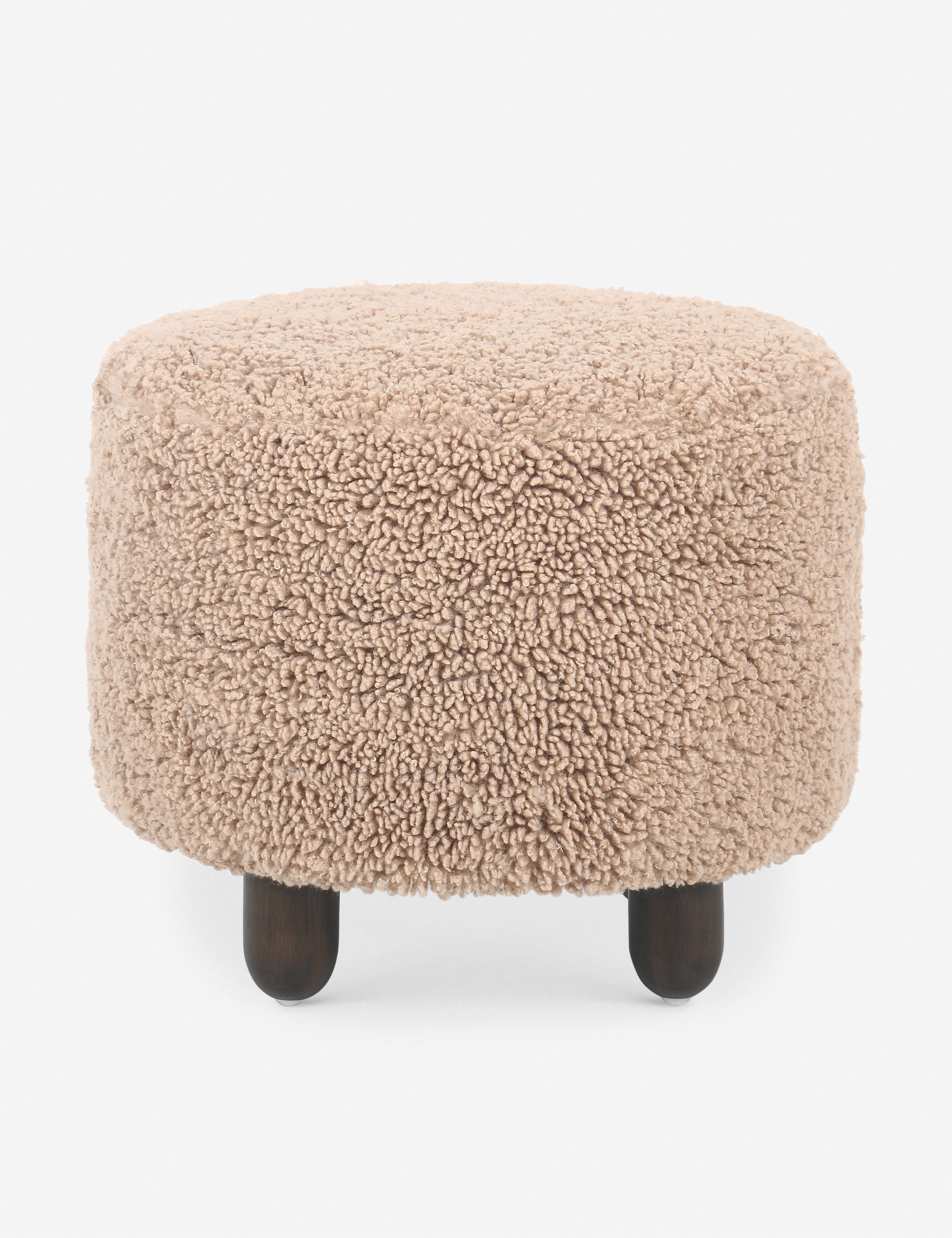 Dover faux shearline round ottoman.
