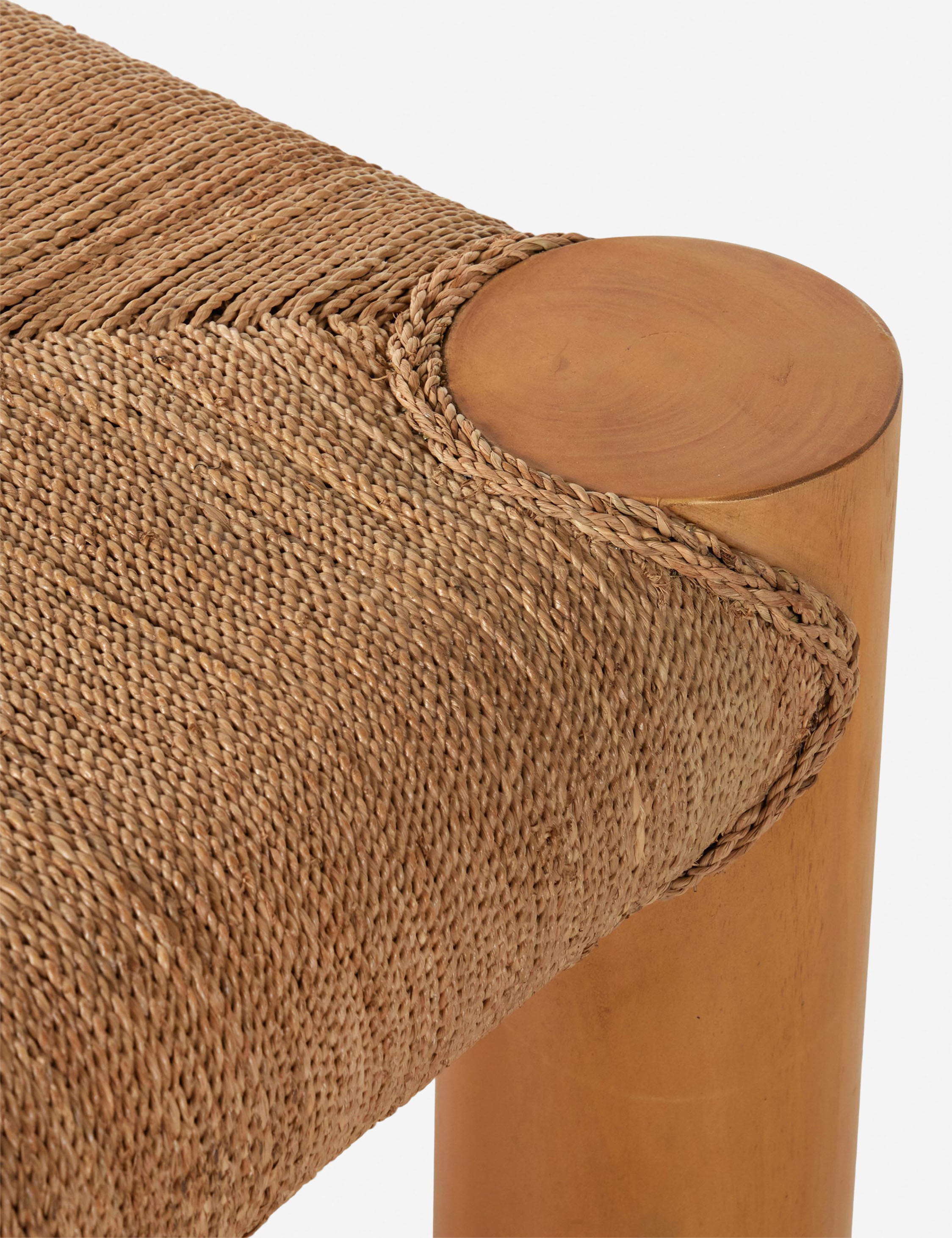Close up view of the Lerner mahogany wood woven top coffee table.