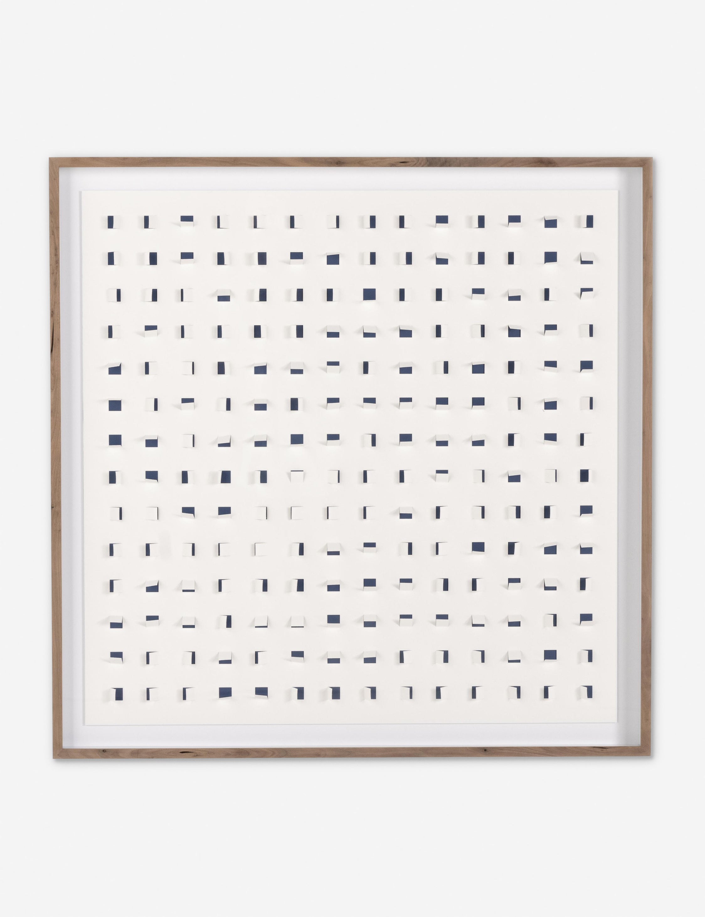 See Through navy and white wall art featuring square paper cutouts with flaps on a linen backdrop