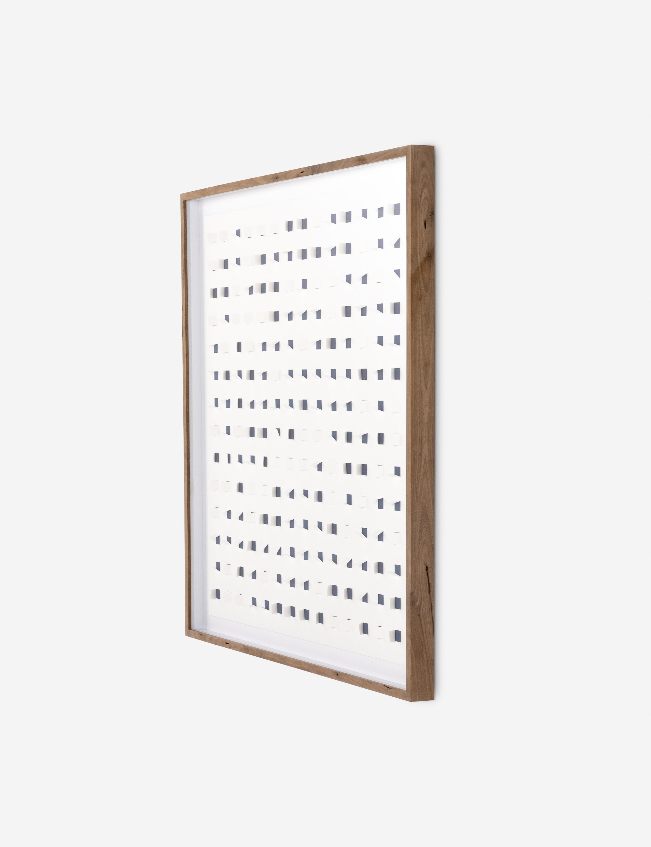 Angled view of the See through navy and white wall art