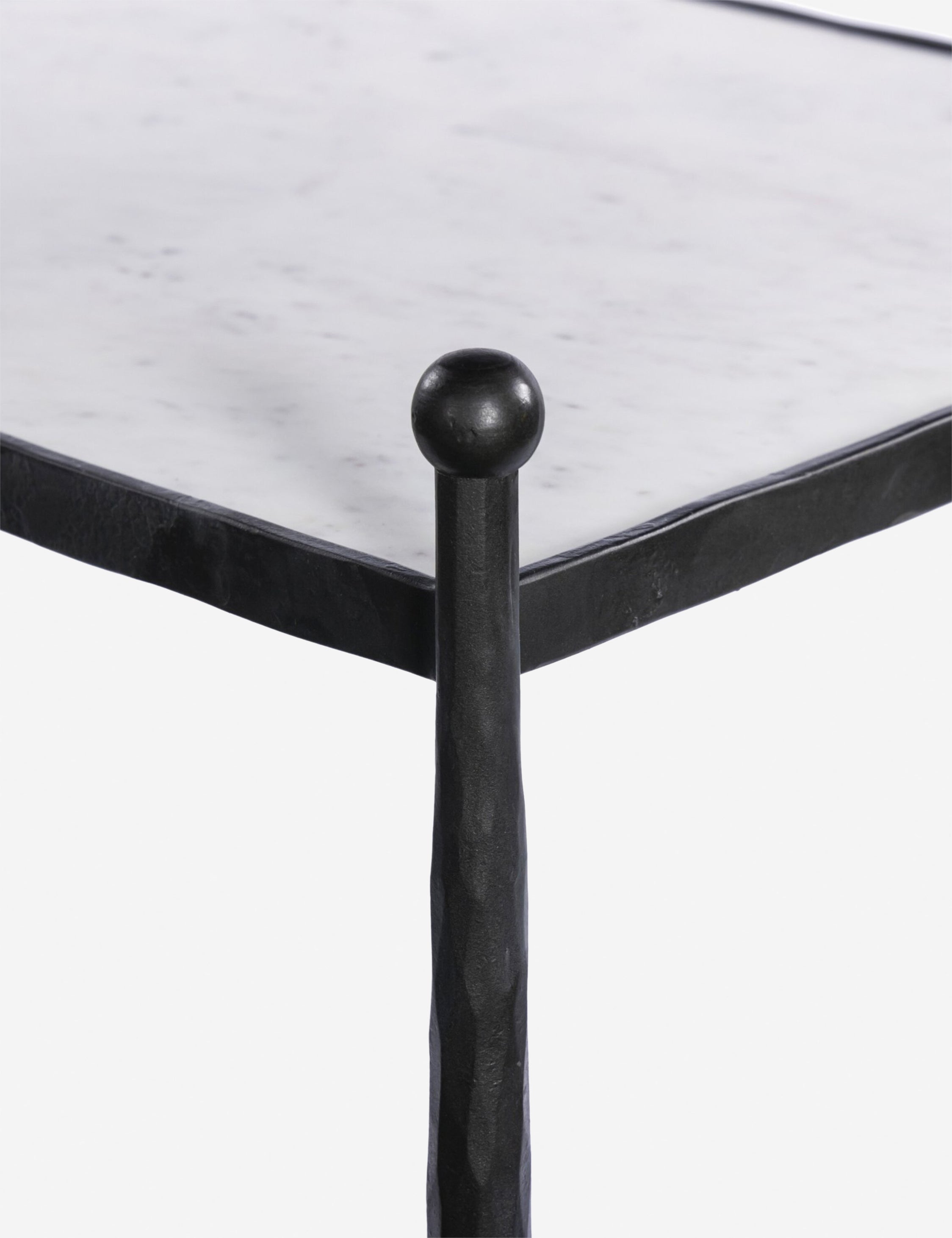 Close up of the Verdi metal and marble rolling outdoor bar cart.