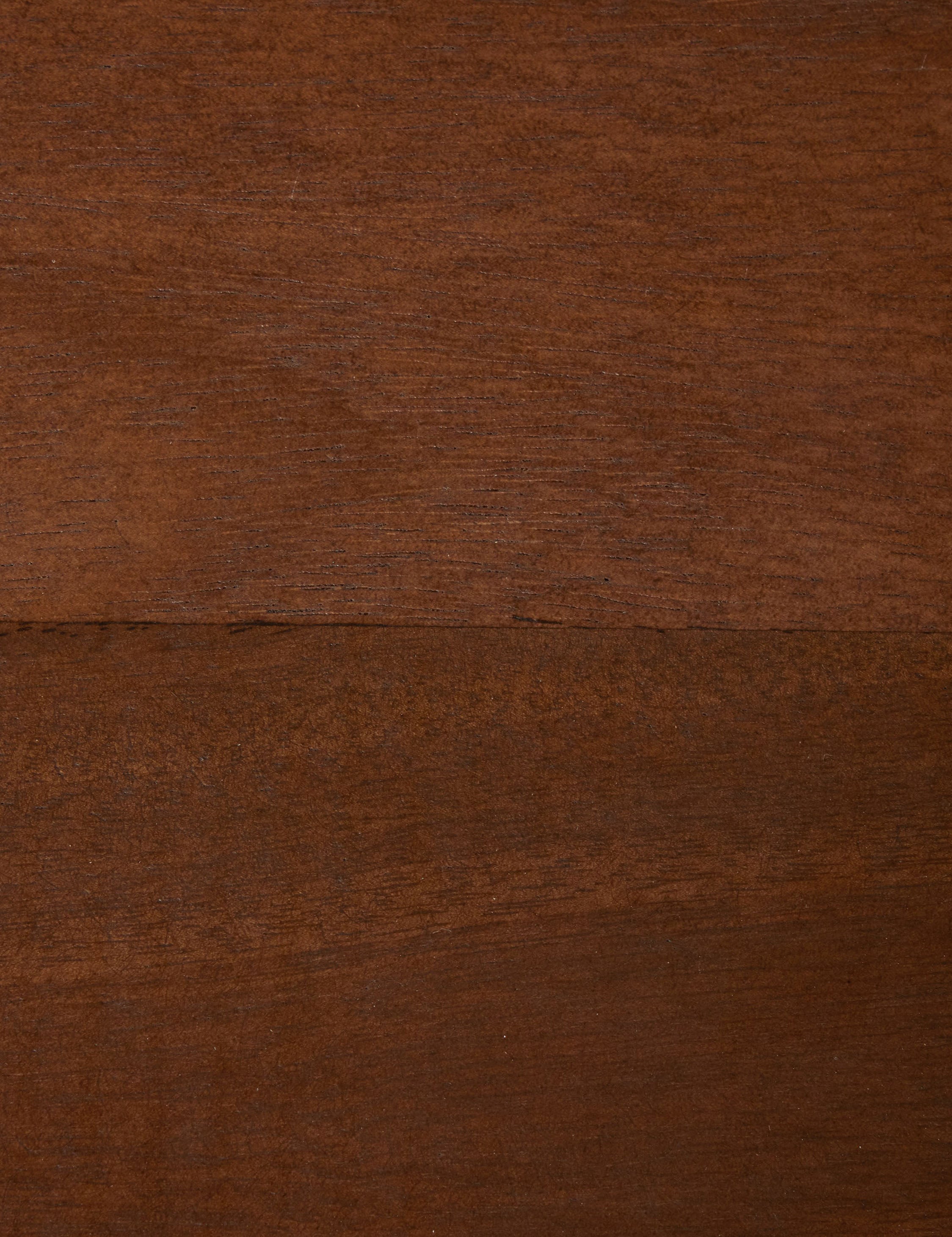 Wood grain of the Mannion modern square leg dining table.