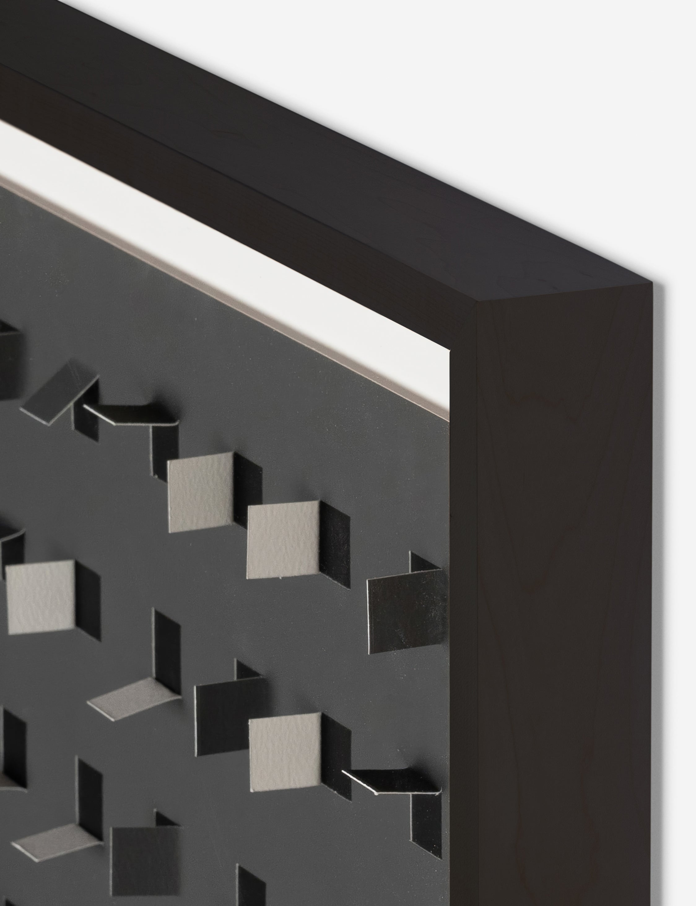 Corner of the See through charcoal gray and black wall art