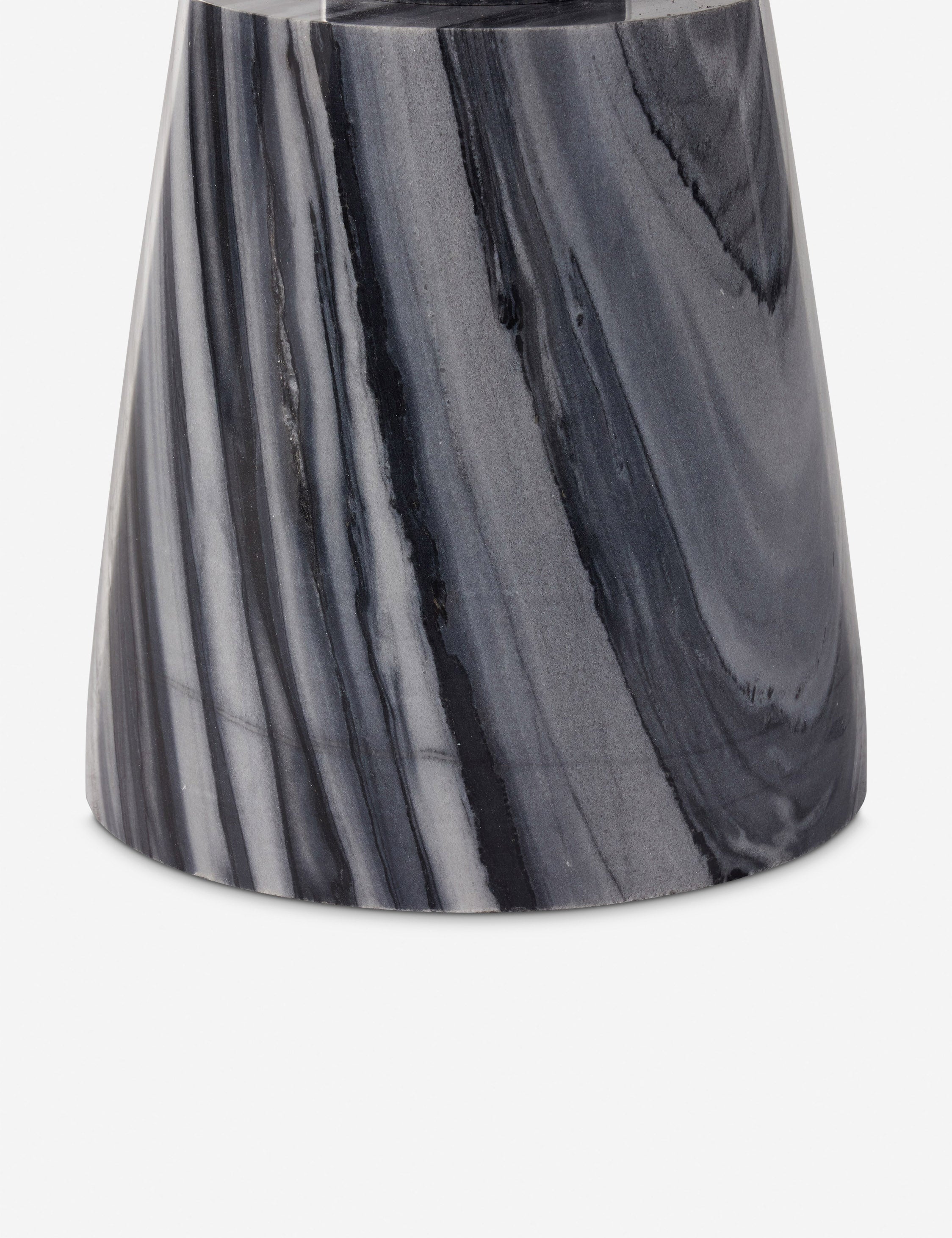 Base of the Zeller round carved ebony marble side table.