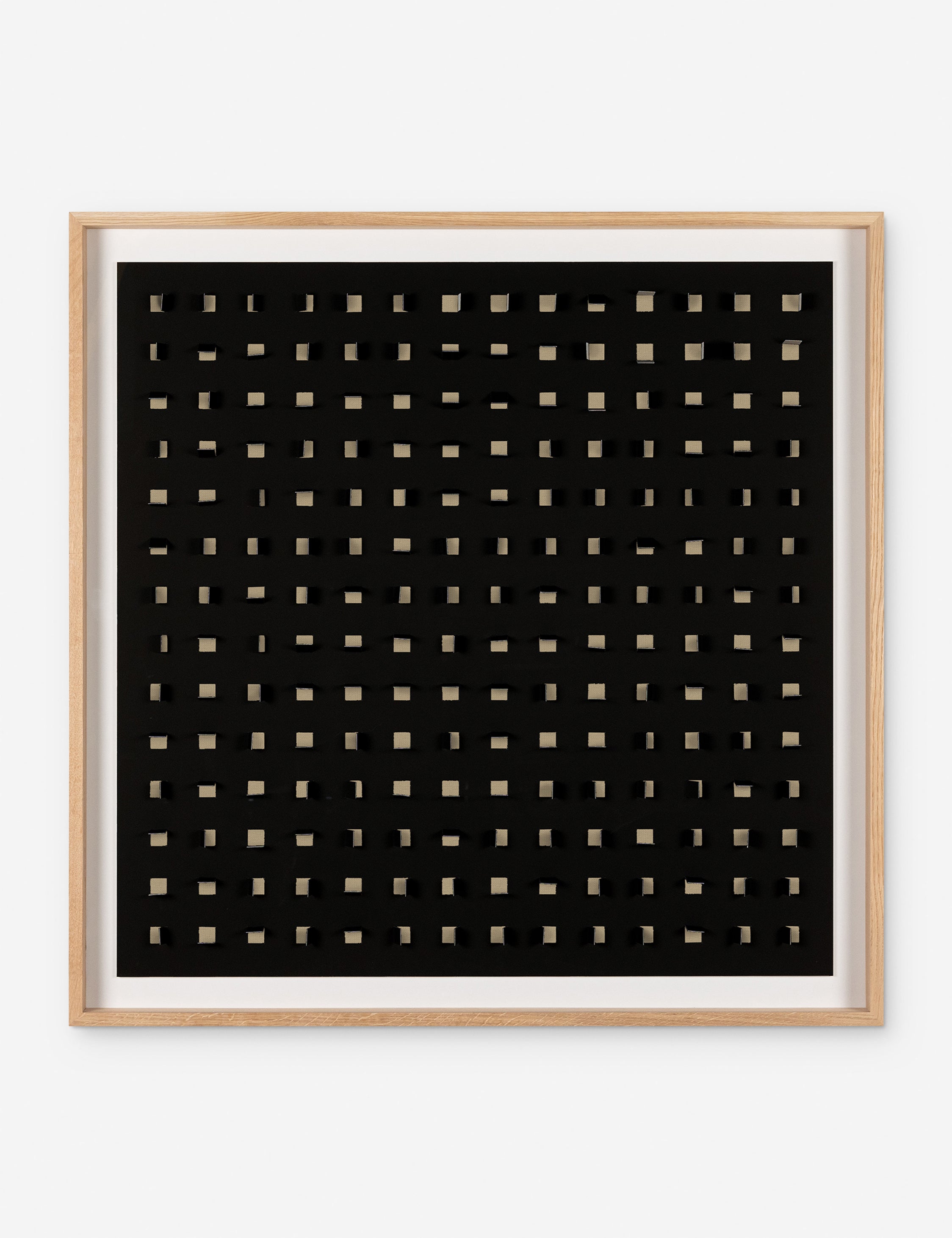 See Through tan and black wall art featuring square paper cutouts with flaps on a linen backdrop