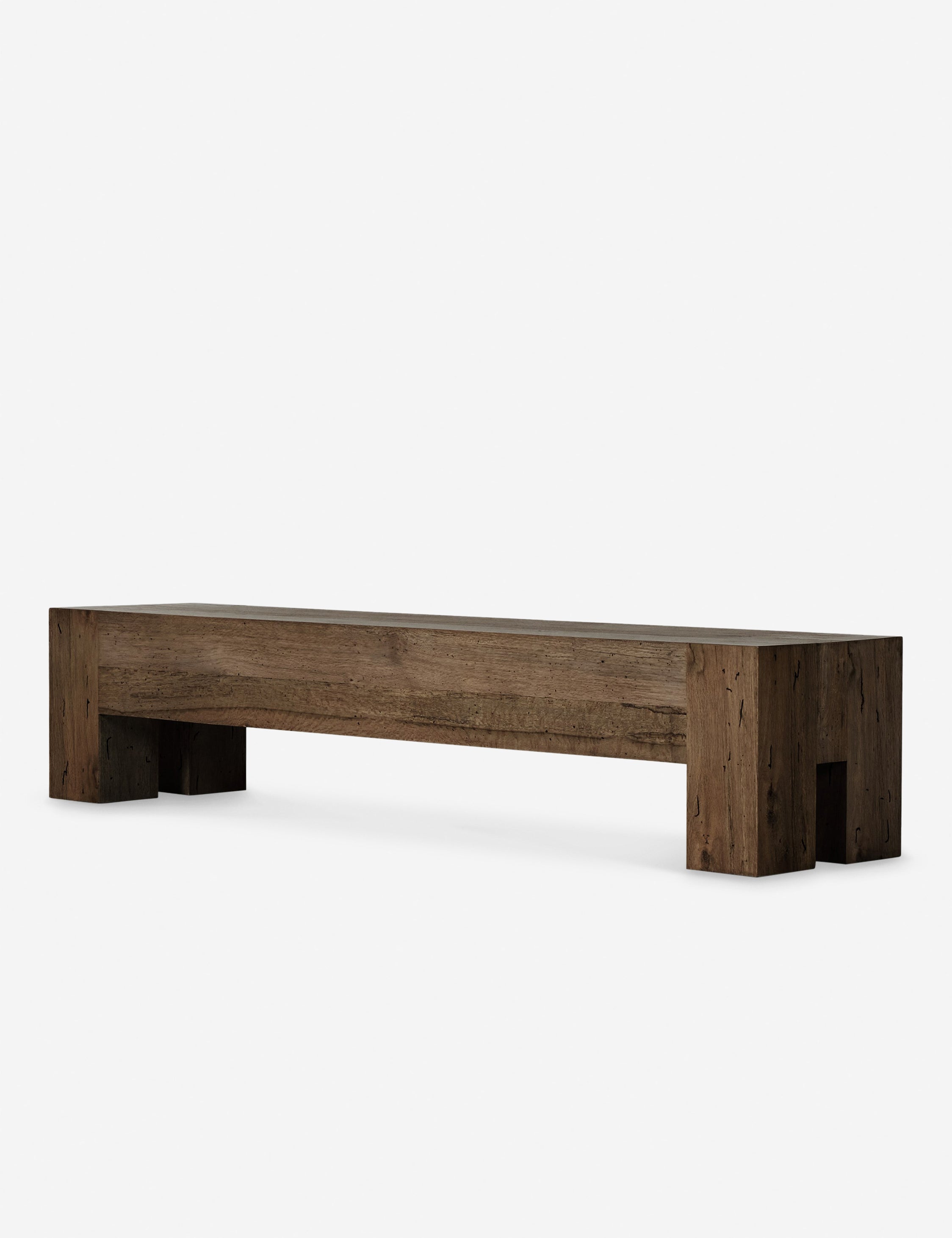 Angled view of the Bevan chunky leg distressed wood bench in brown.