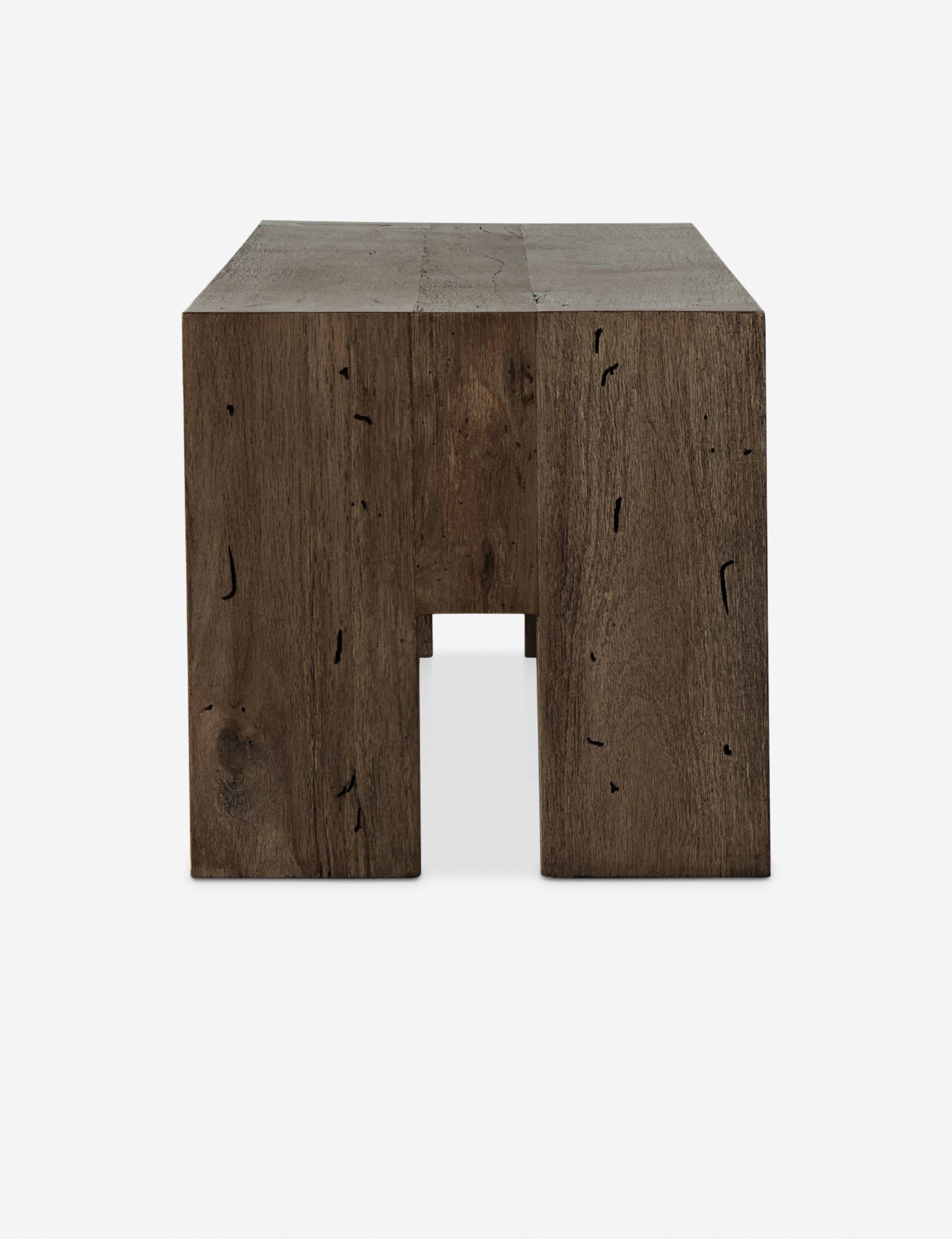 Side view of the Bevan chunky leg distressed wood bench in brown.