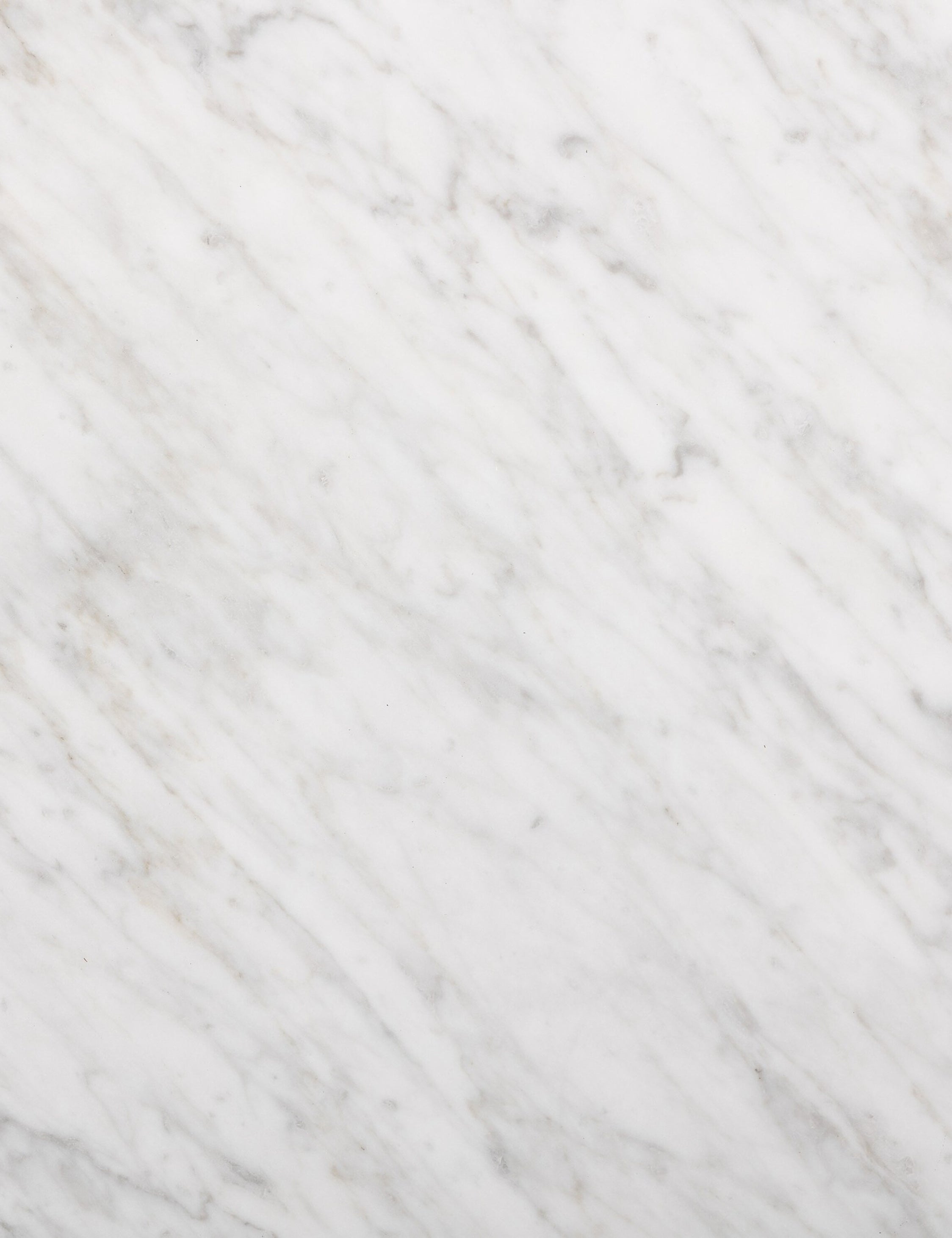 Close up of the stone of the Ozawa mixed-material, marble top coffee table.