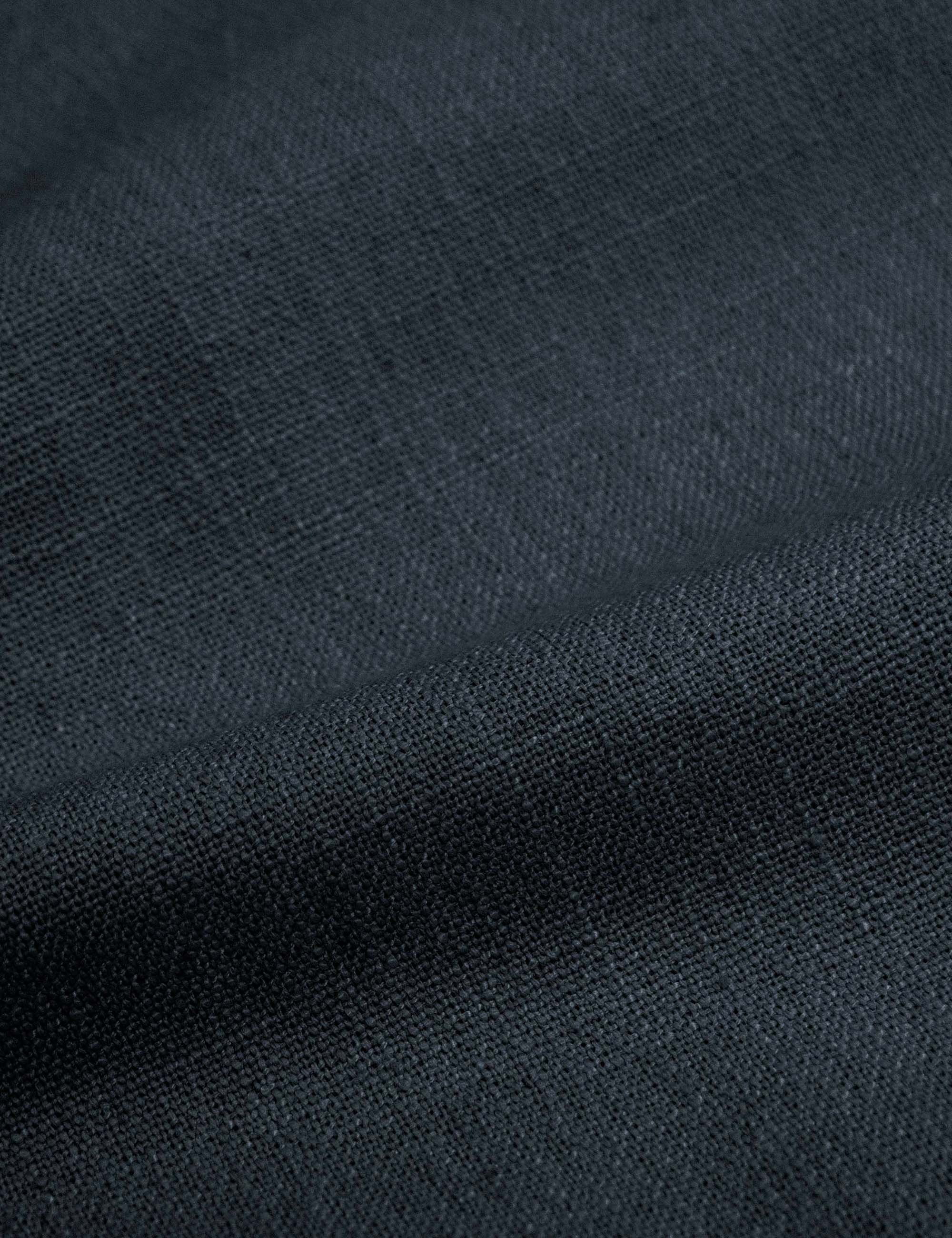 Detailed shot of the navy linen on the Adara navy linen upholstered bed.