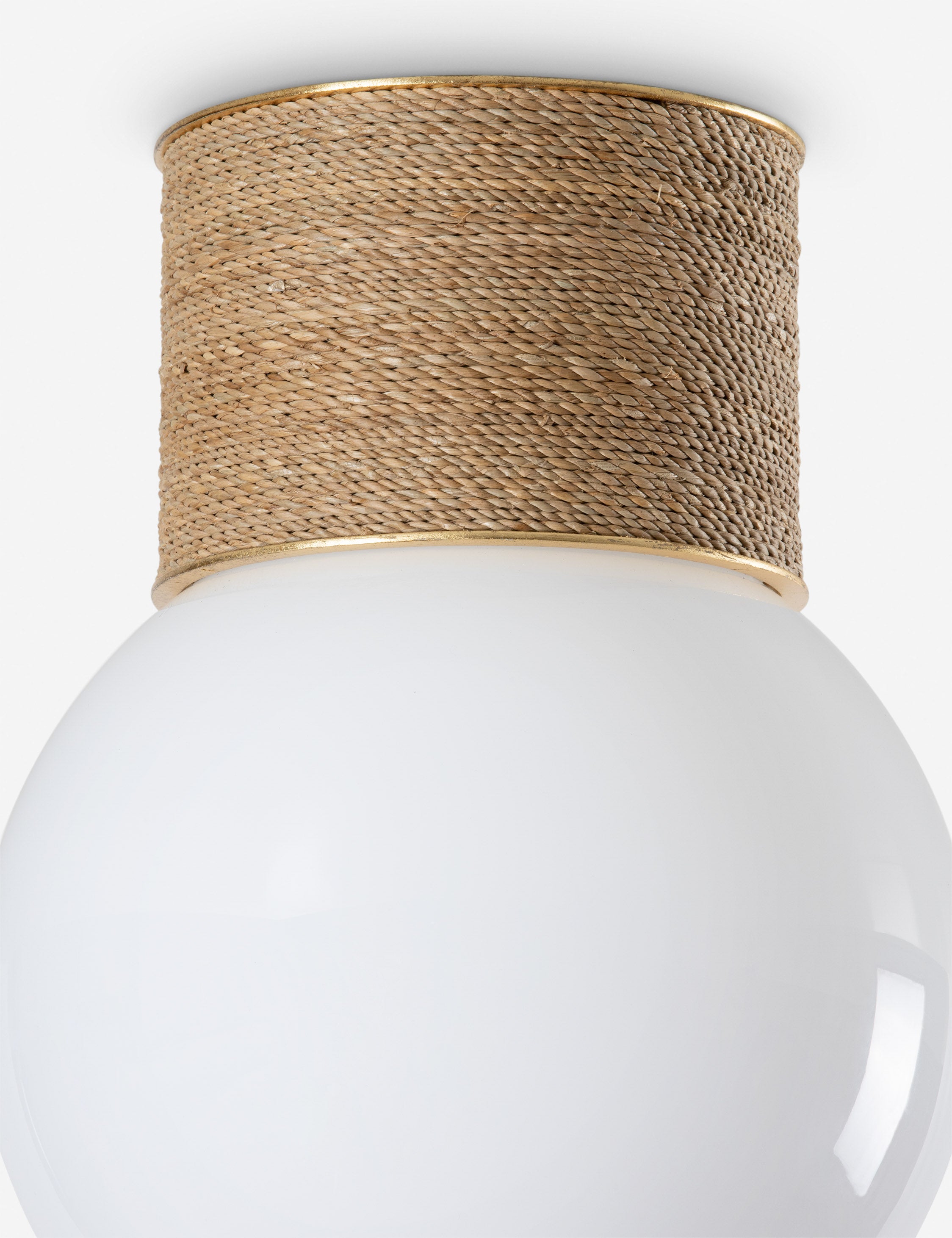 Close up of the Jahan coastal rope wrapped flush mount light.