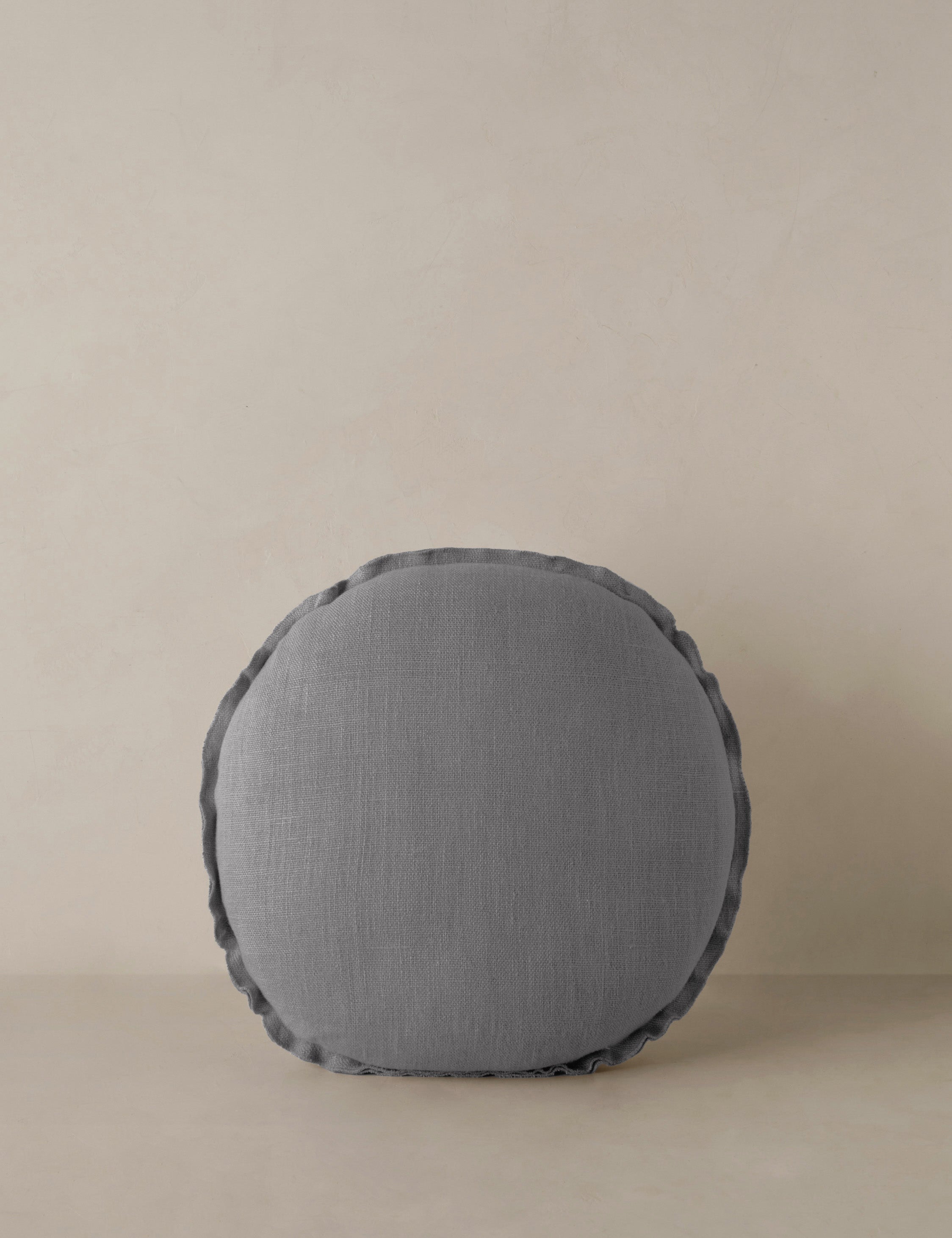 Arlo linen flange trim round pillow.