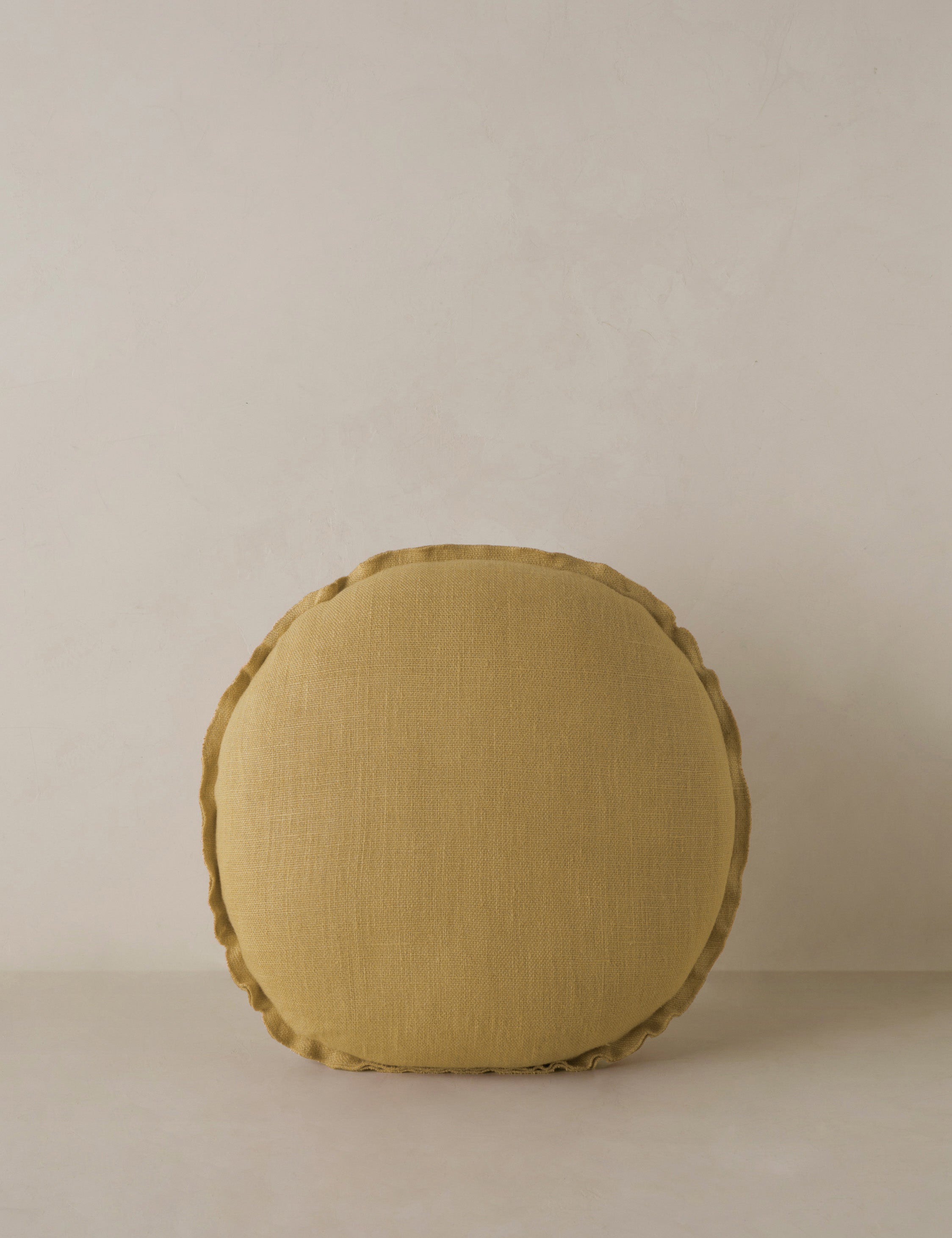 Arlo linen flange trim round pillow.