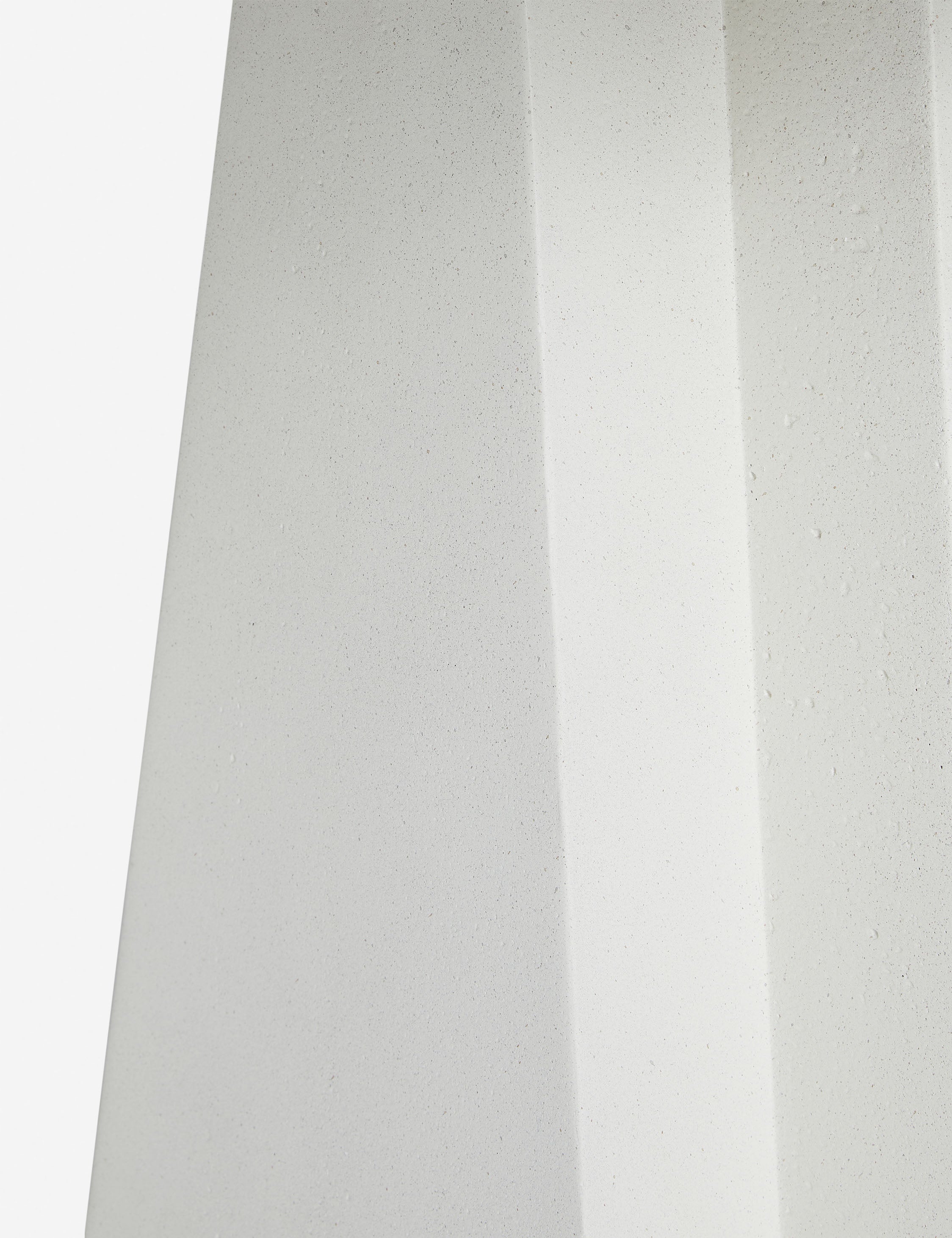 Close up of the base of the Avila modern round pedestal dining table.