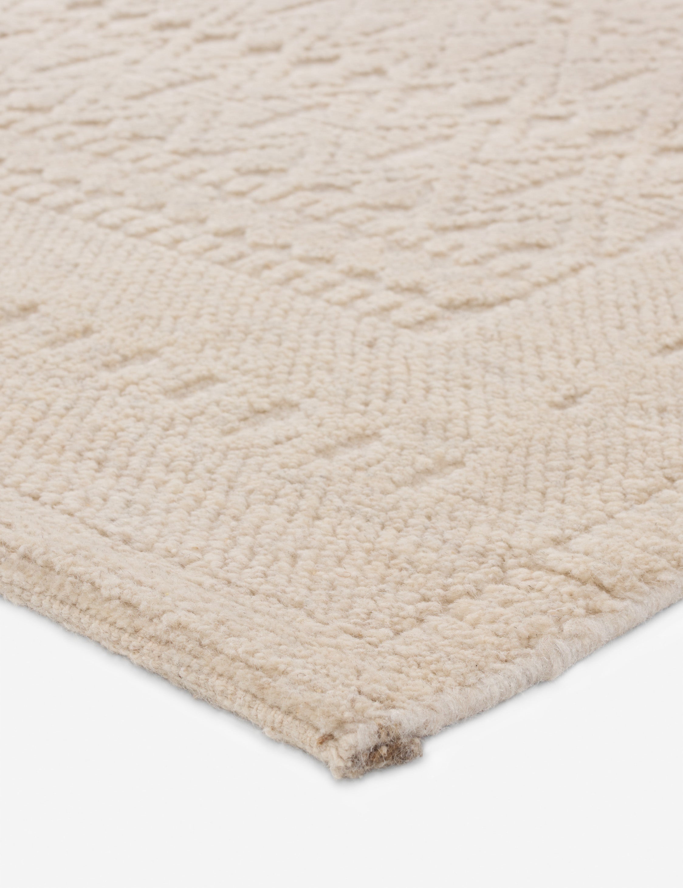 Close up view of the Pavan moroccan-inspired hand-knotted wool rug.