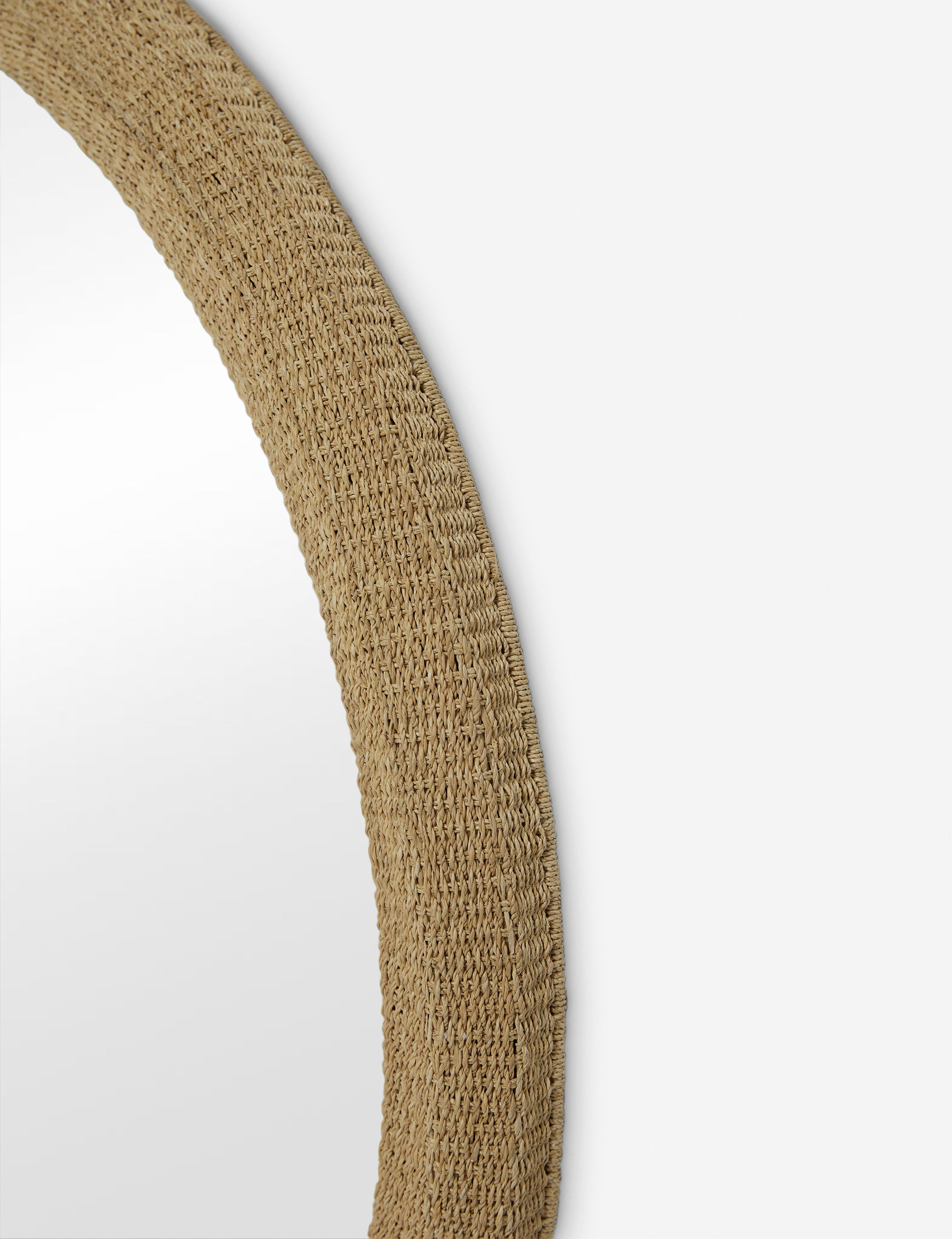 Close up of the Bode rope wrapped natural round mirror