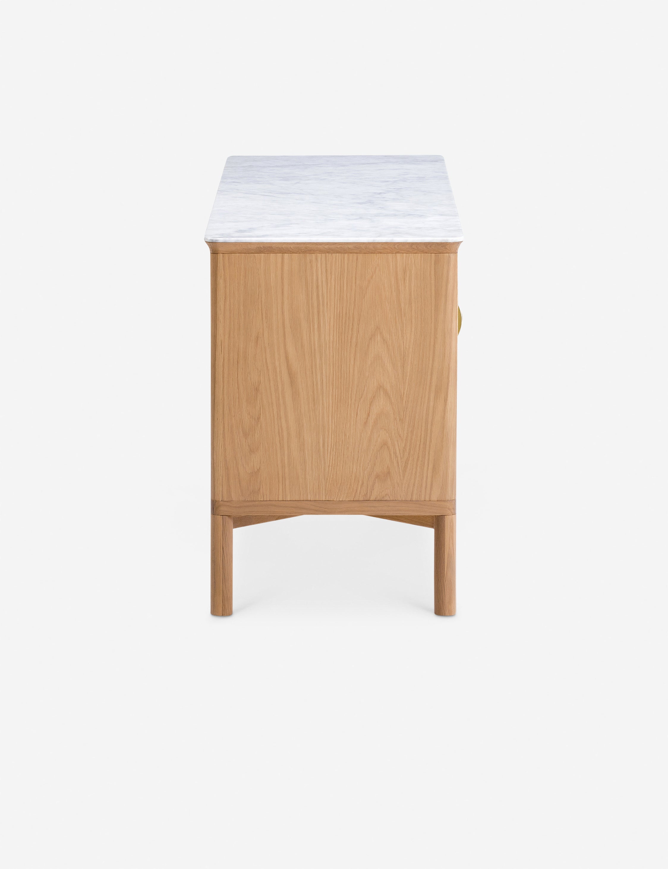 Side profile of the Matija marble top, reeded door media console
