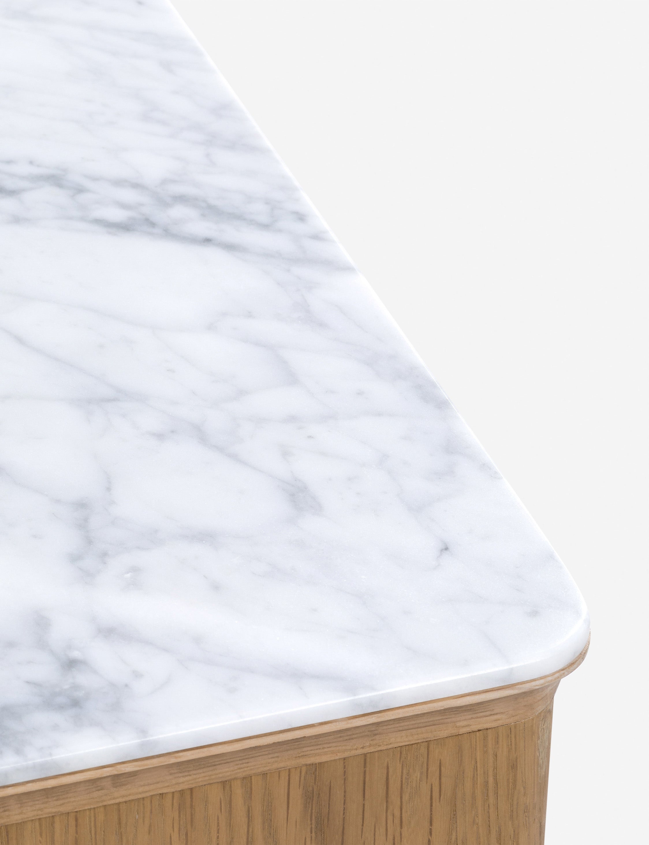 Close up of the top of the Matija marble top, reeded door front cabinet