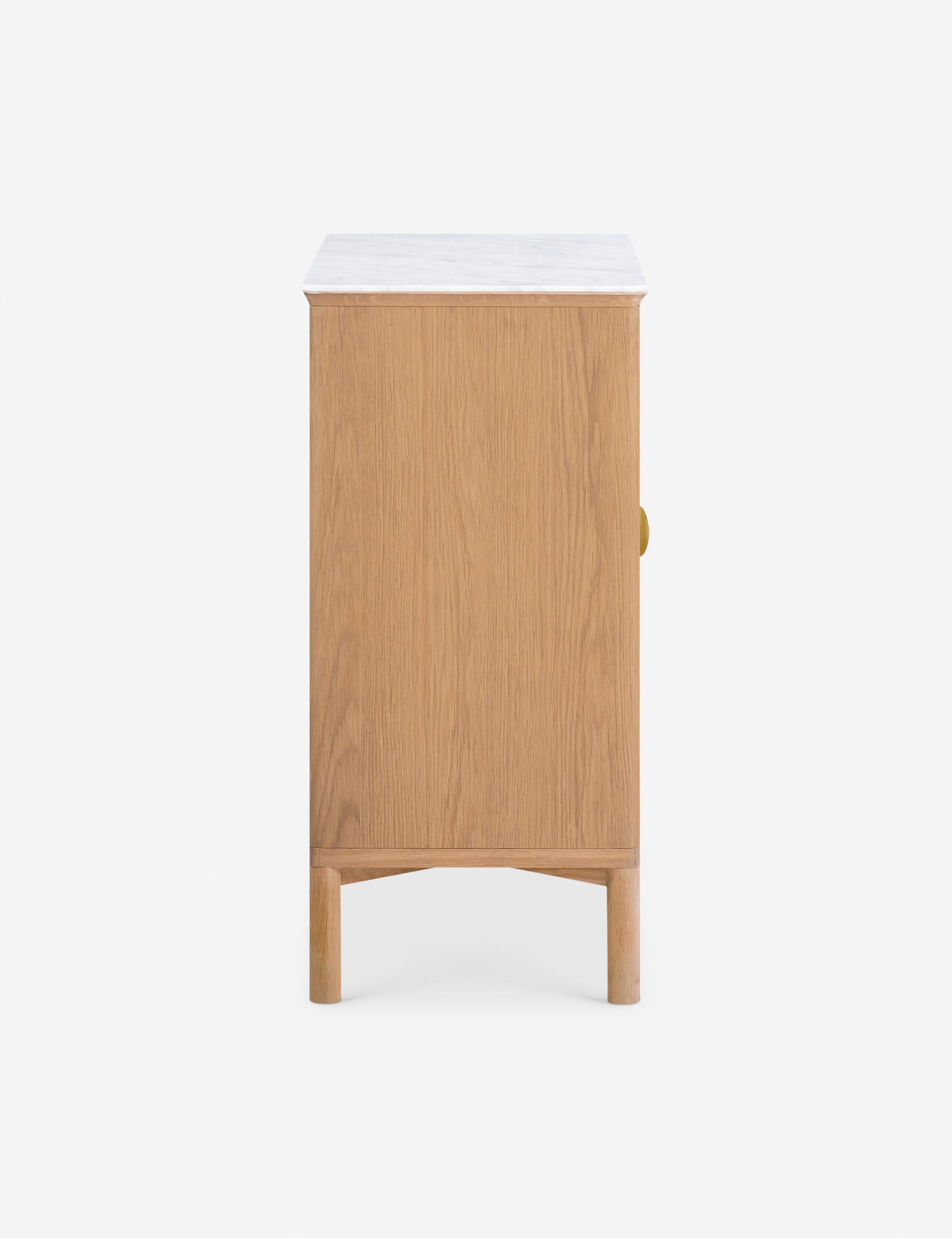 Side profile of the Matija marble top, reeded door front cabinet