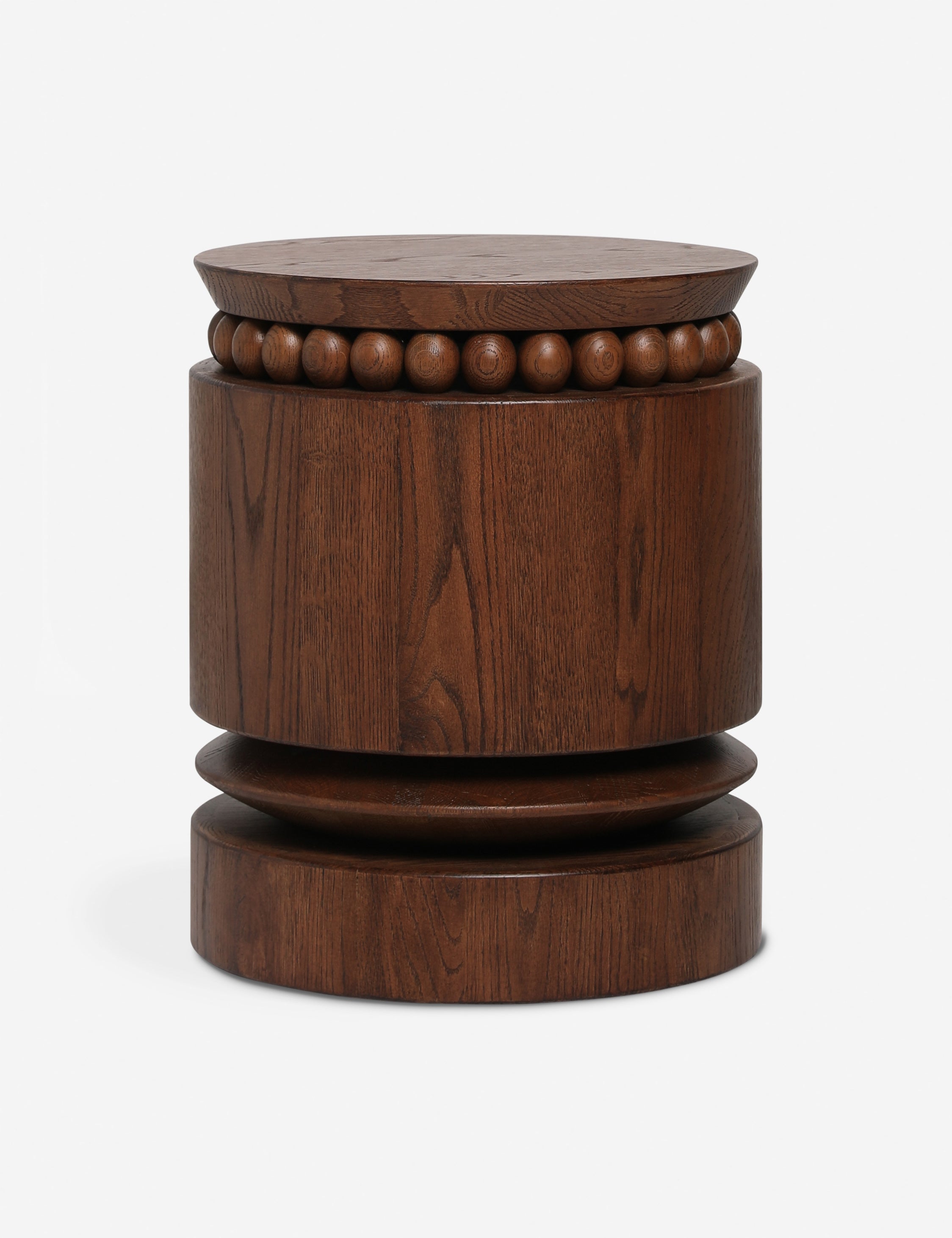 Coco round drum beaded wood side table by Carly Cushnie.