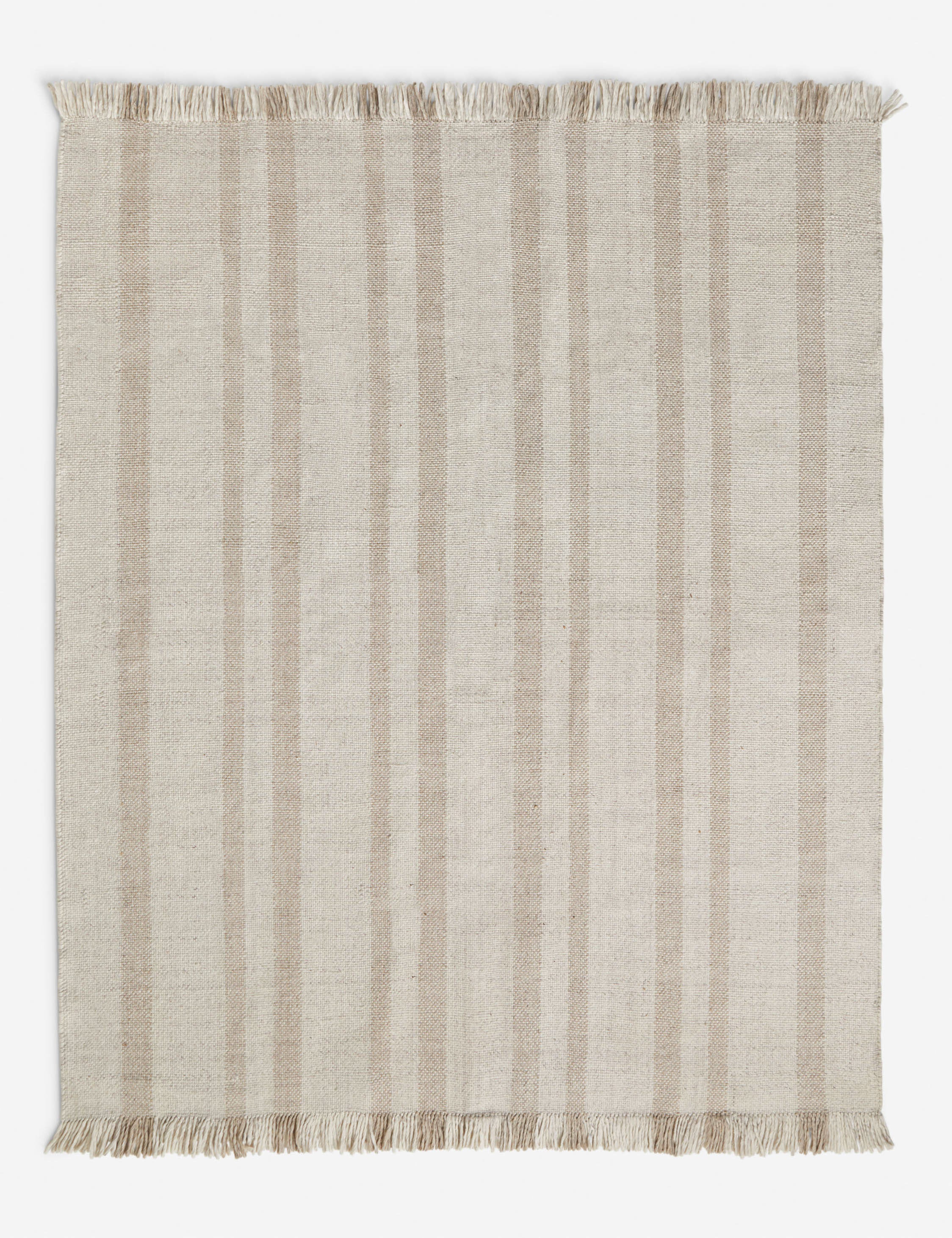 Croze handwoven striped fringed outdoor rug.