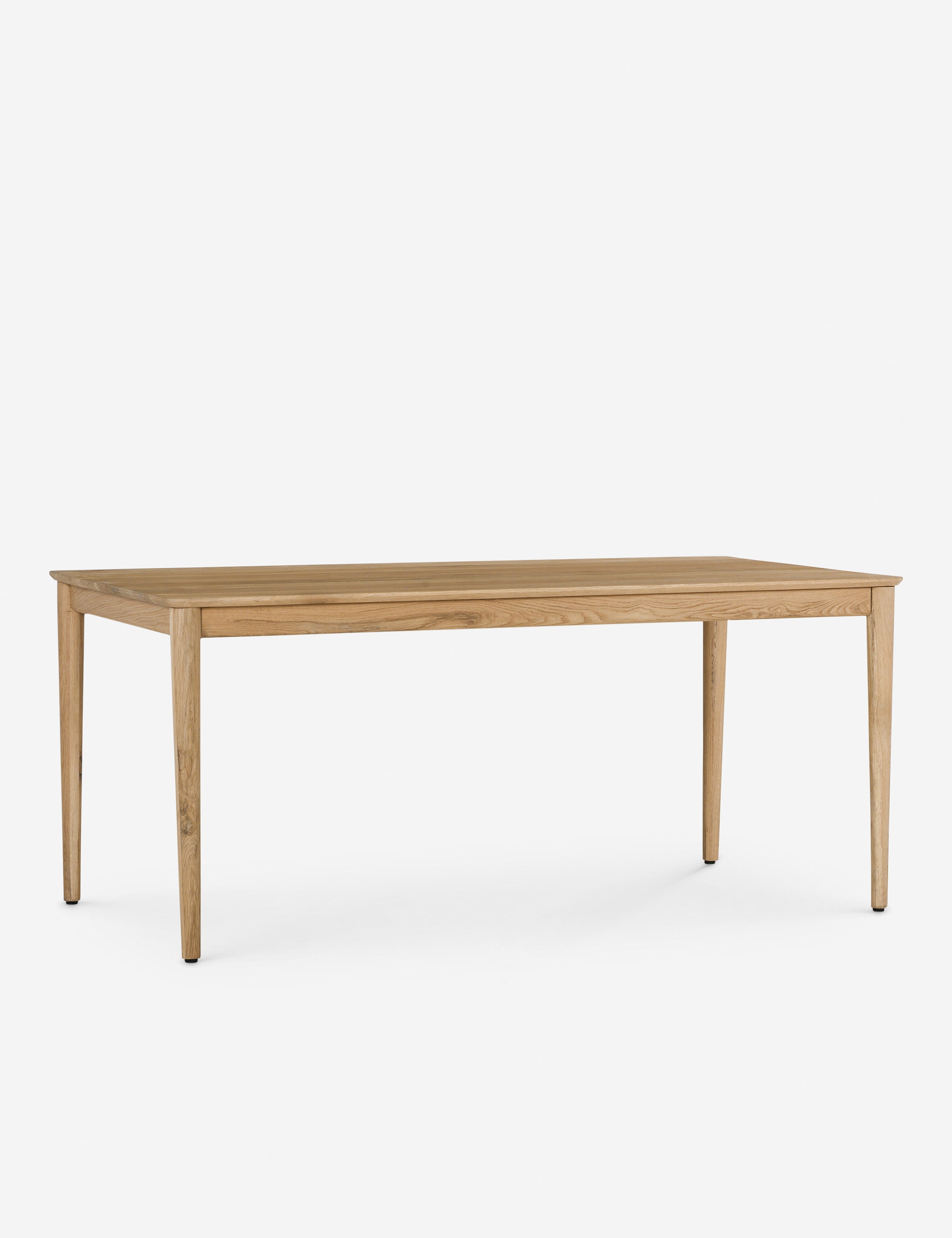 Angled view of the Lussier natural oak tapered leg dining table