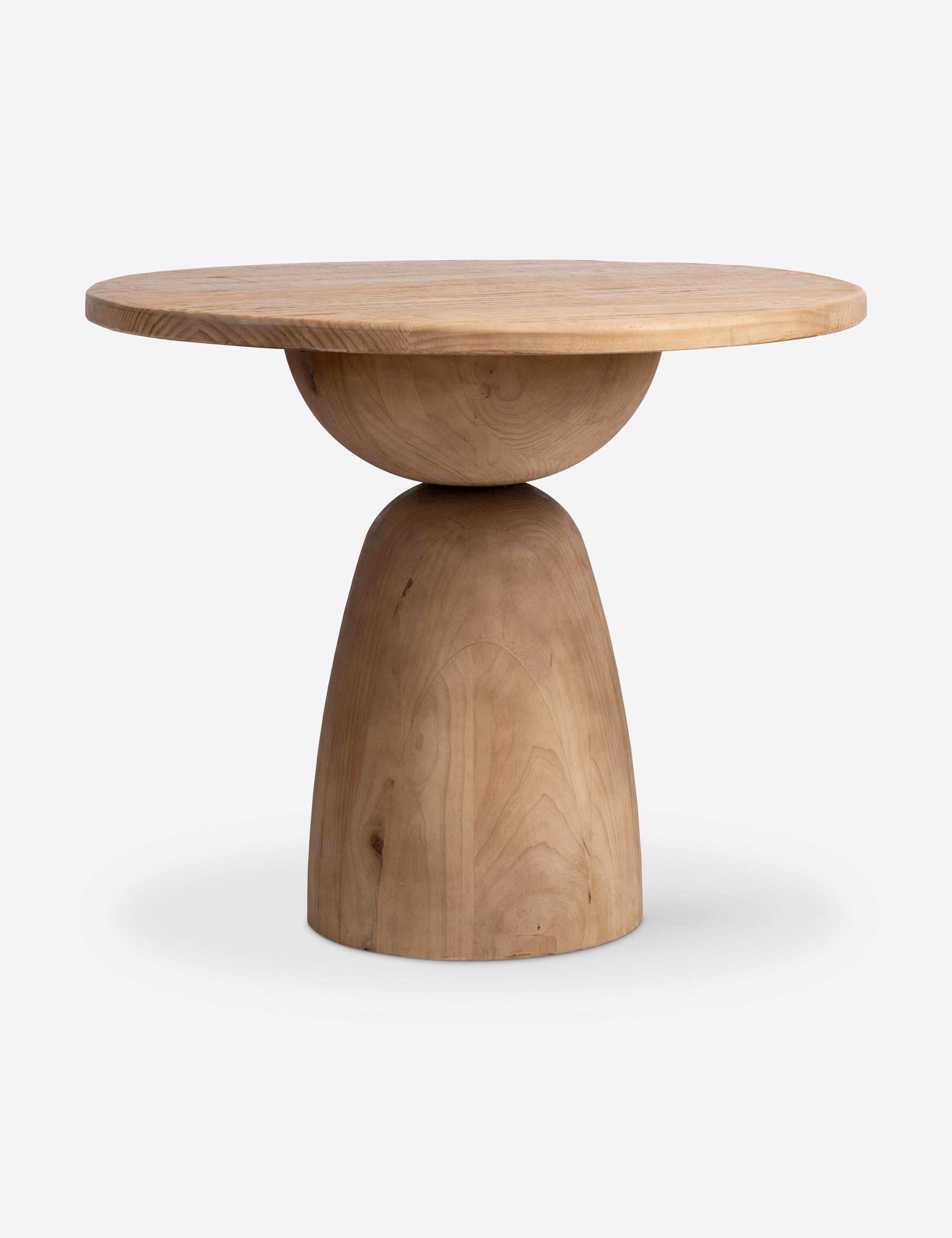 Selvig round sculptural reclaimed pine coffee table.