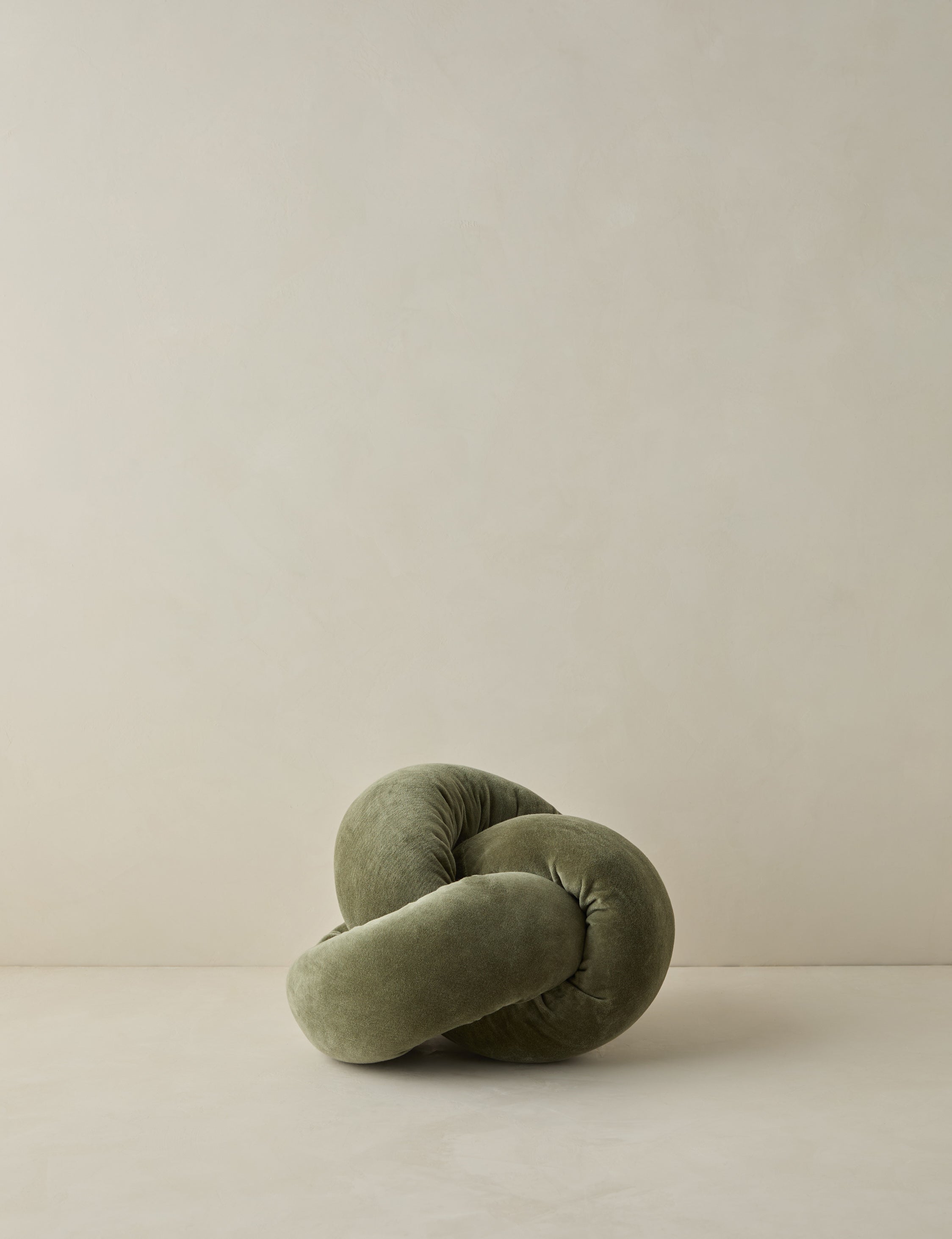 Dewey velvet knot ball pillow.