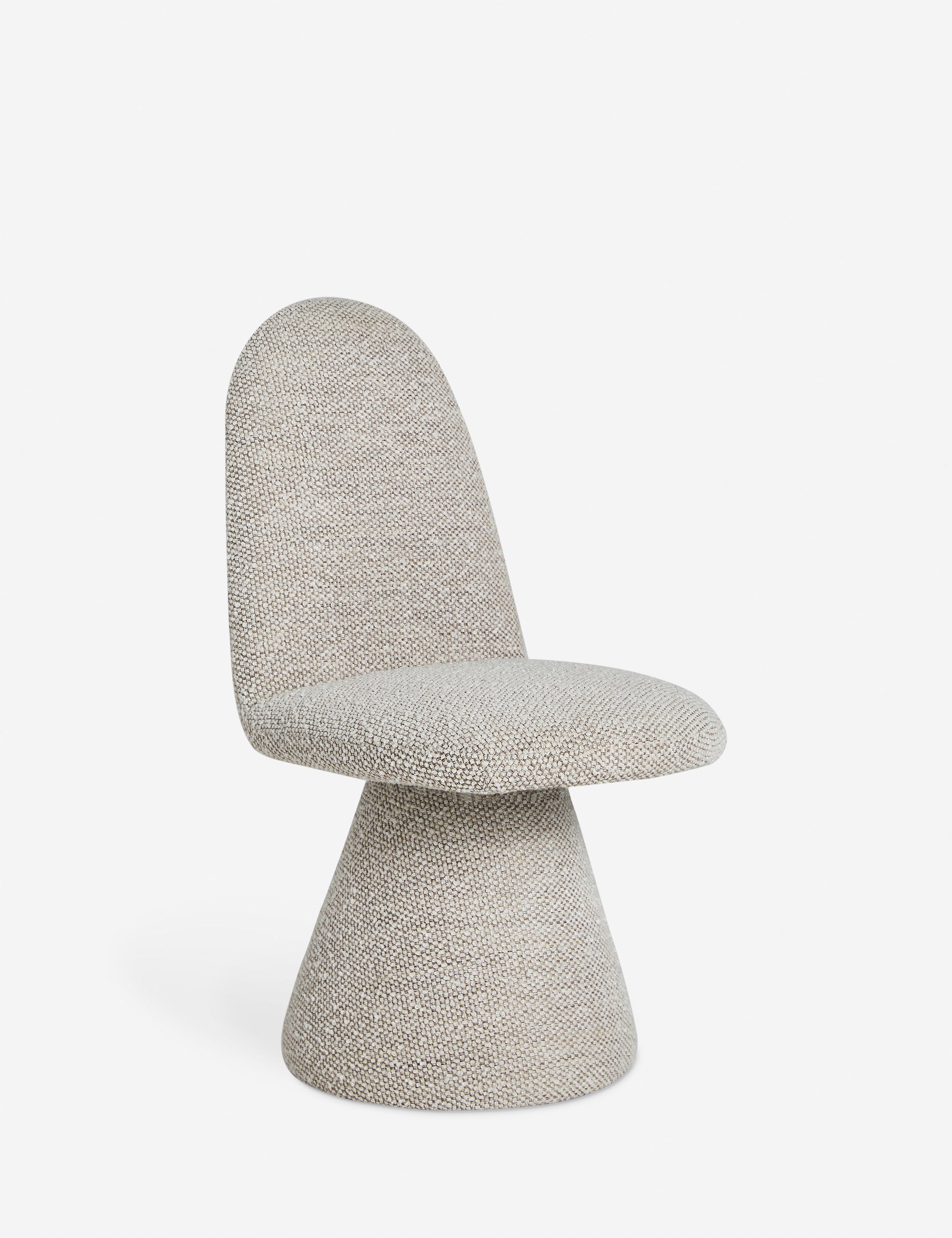 Angled view of the Fenton textured sculptural upholstered minimalist dining chair.