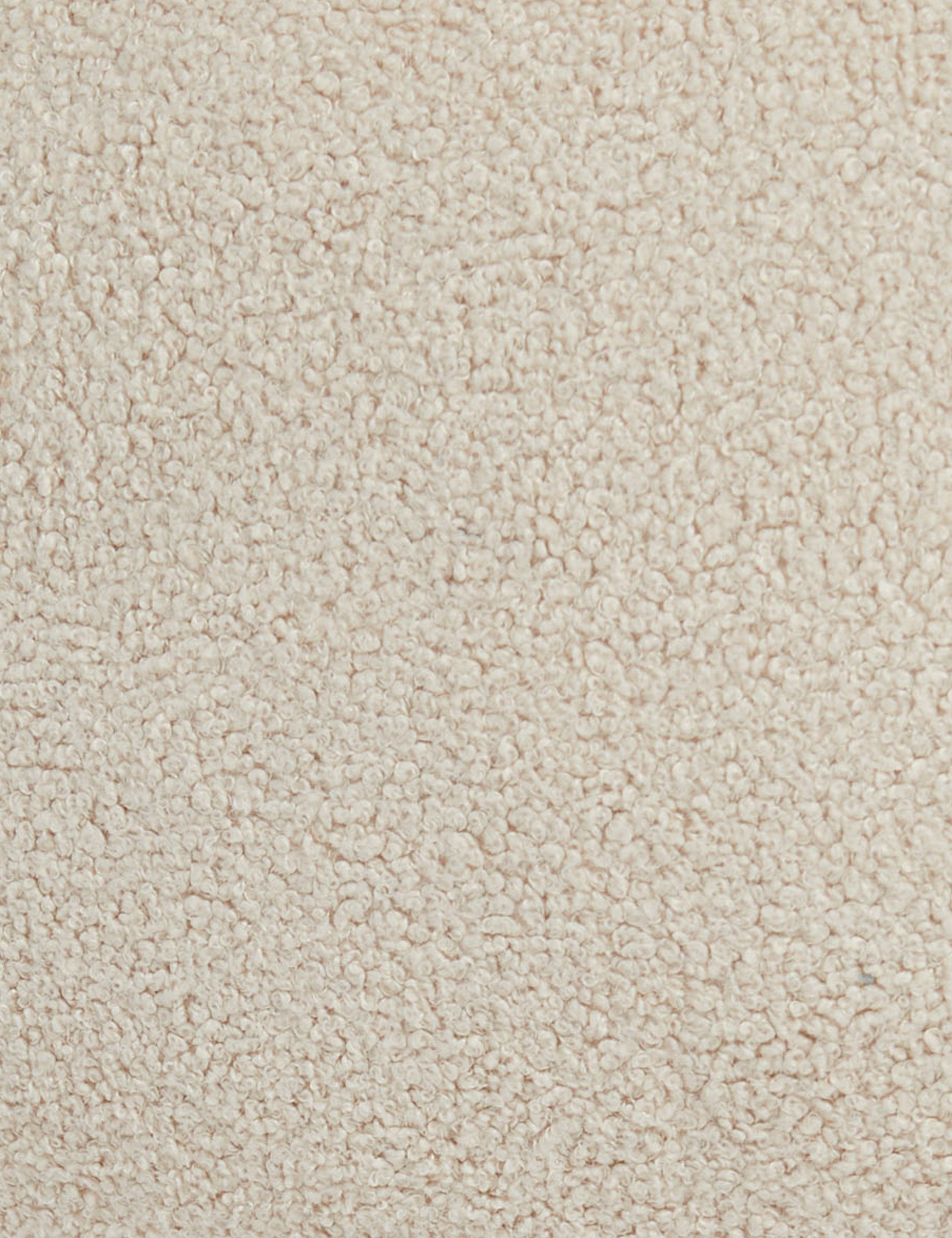 Boucle upholstery of the Fern swivel chair