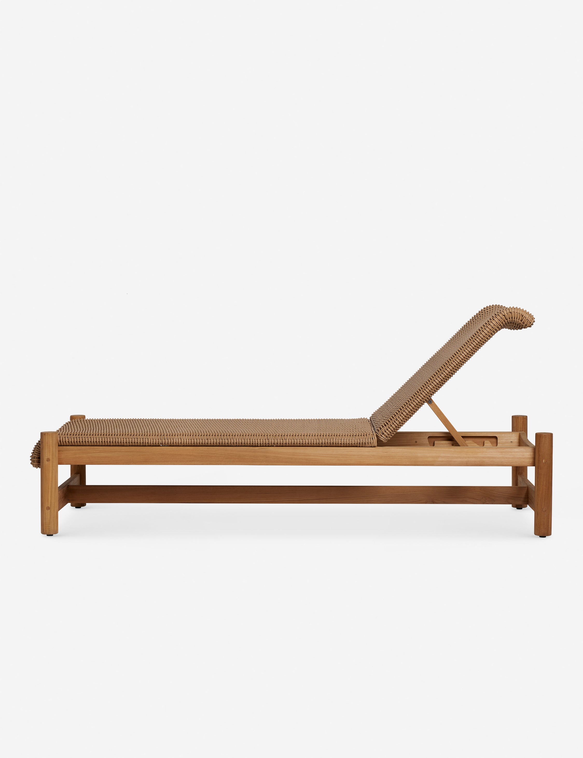 Side profile of the Gally wicker and teak outdoor chaise.