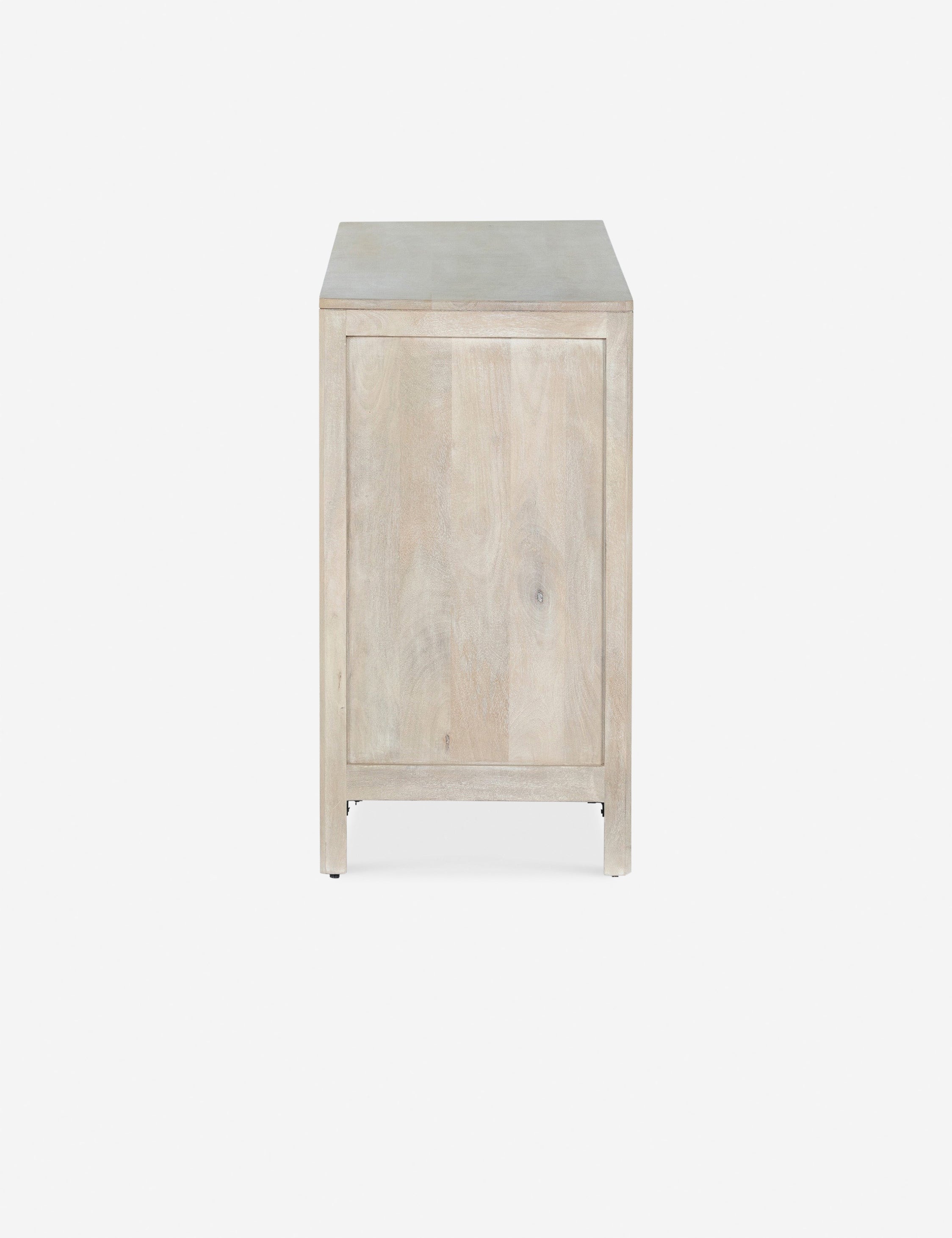 Side view of the Hannah light wood 6-drawer dresser with cane-front drawers