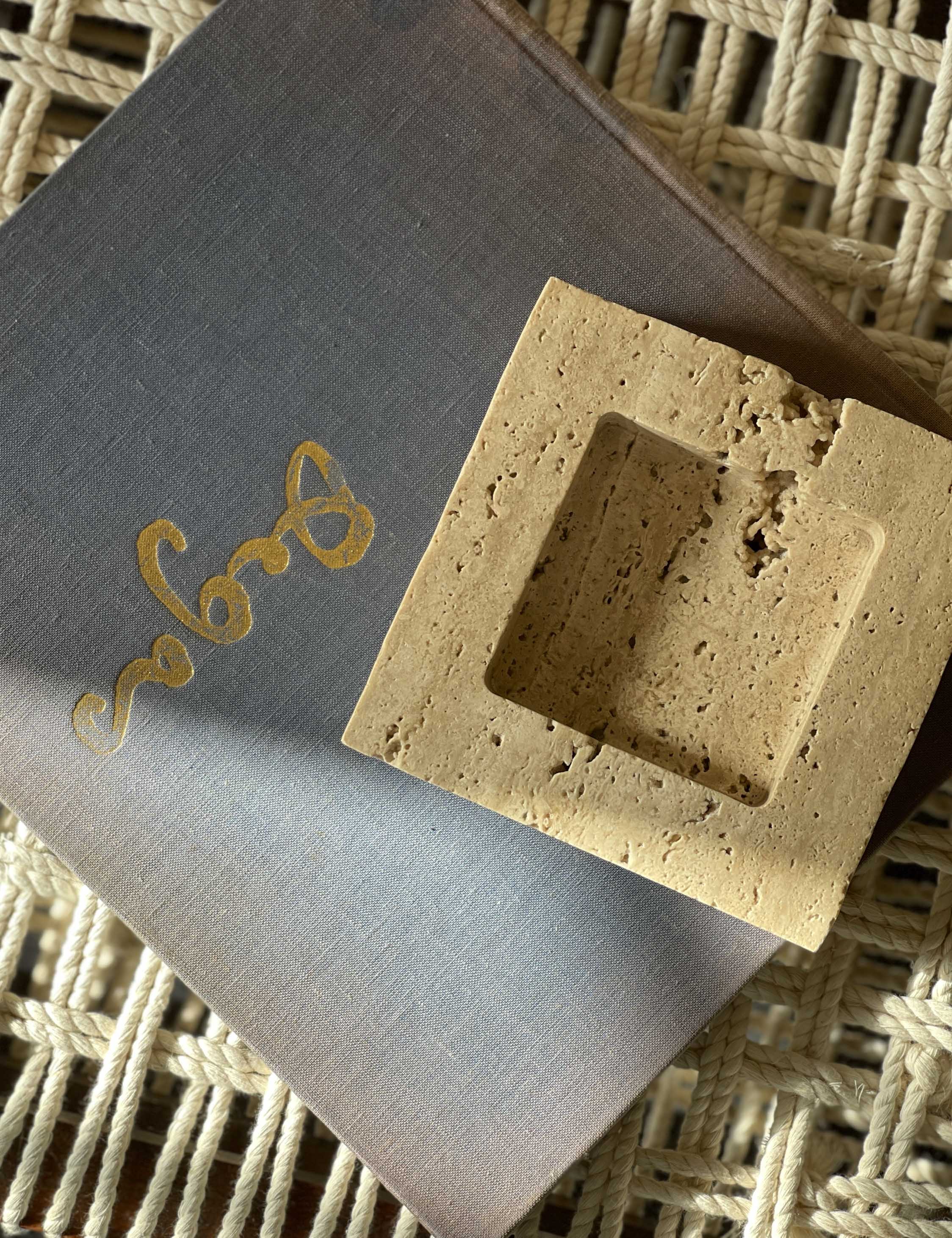 Teo catchall square tray in travertine used as decoration