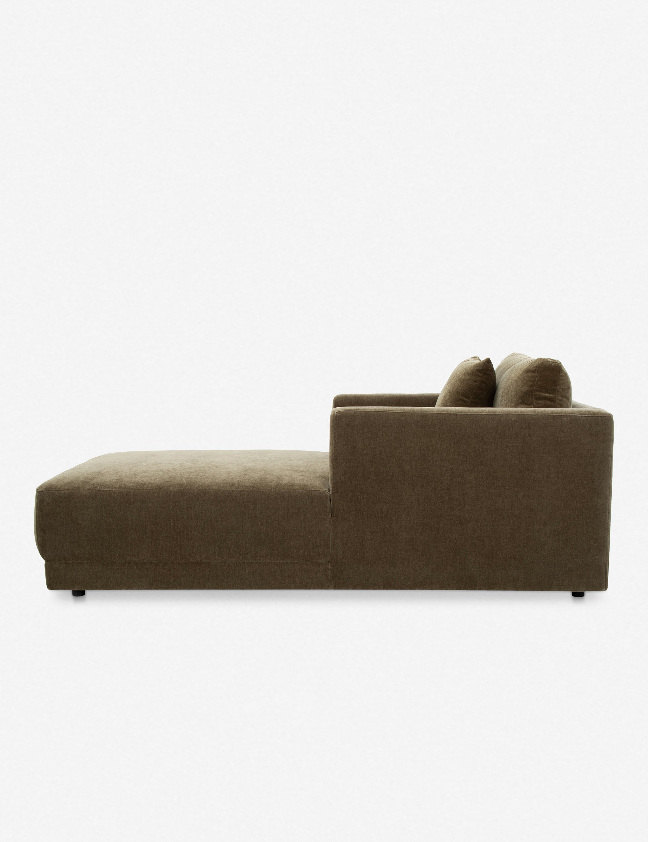 Side profile of the Braque velvet upholstered chaise lounge chair.