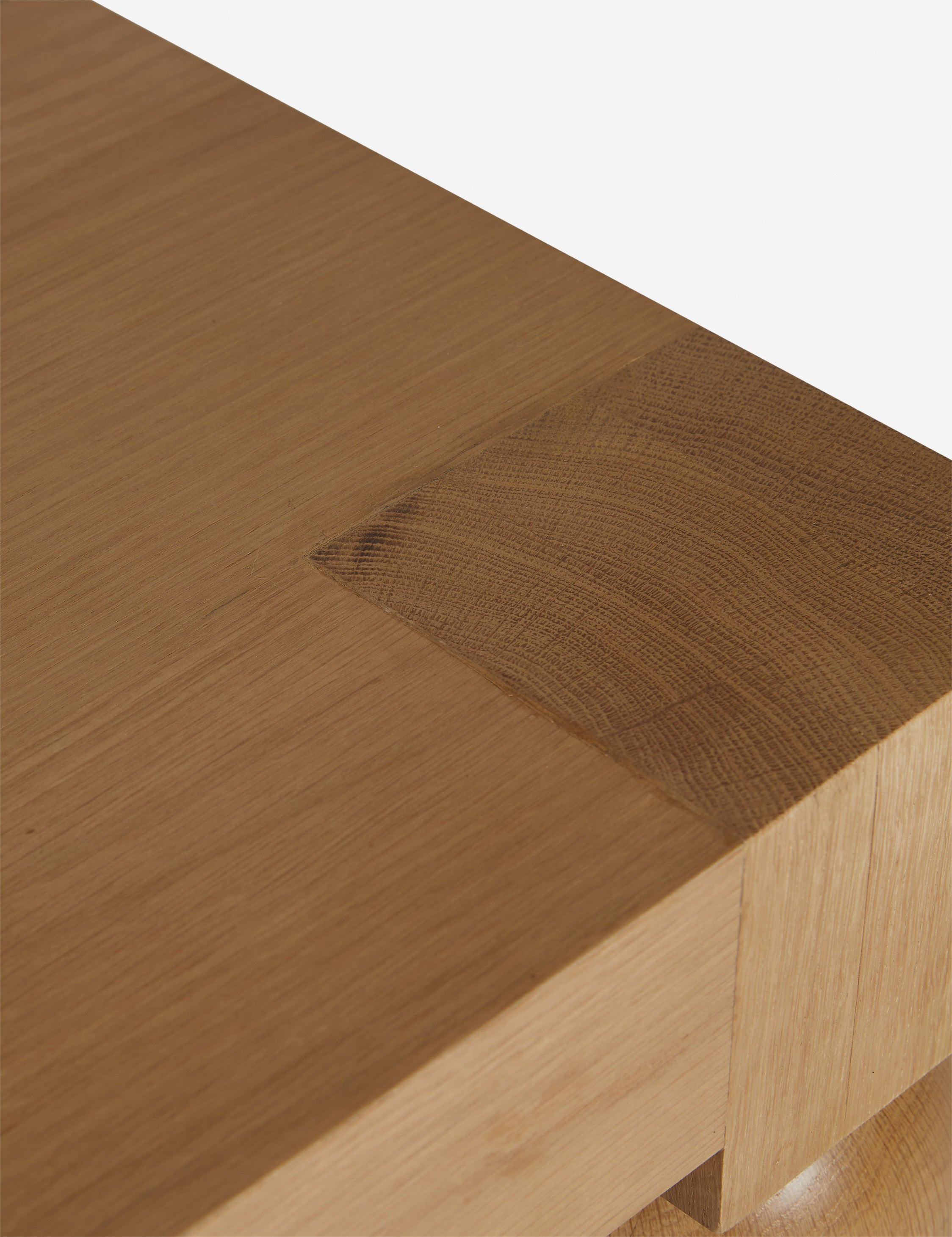Close up of the Kent sculptural modern square side table.