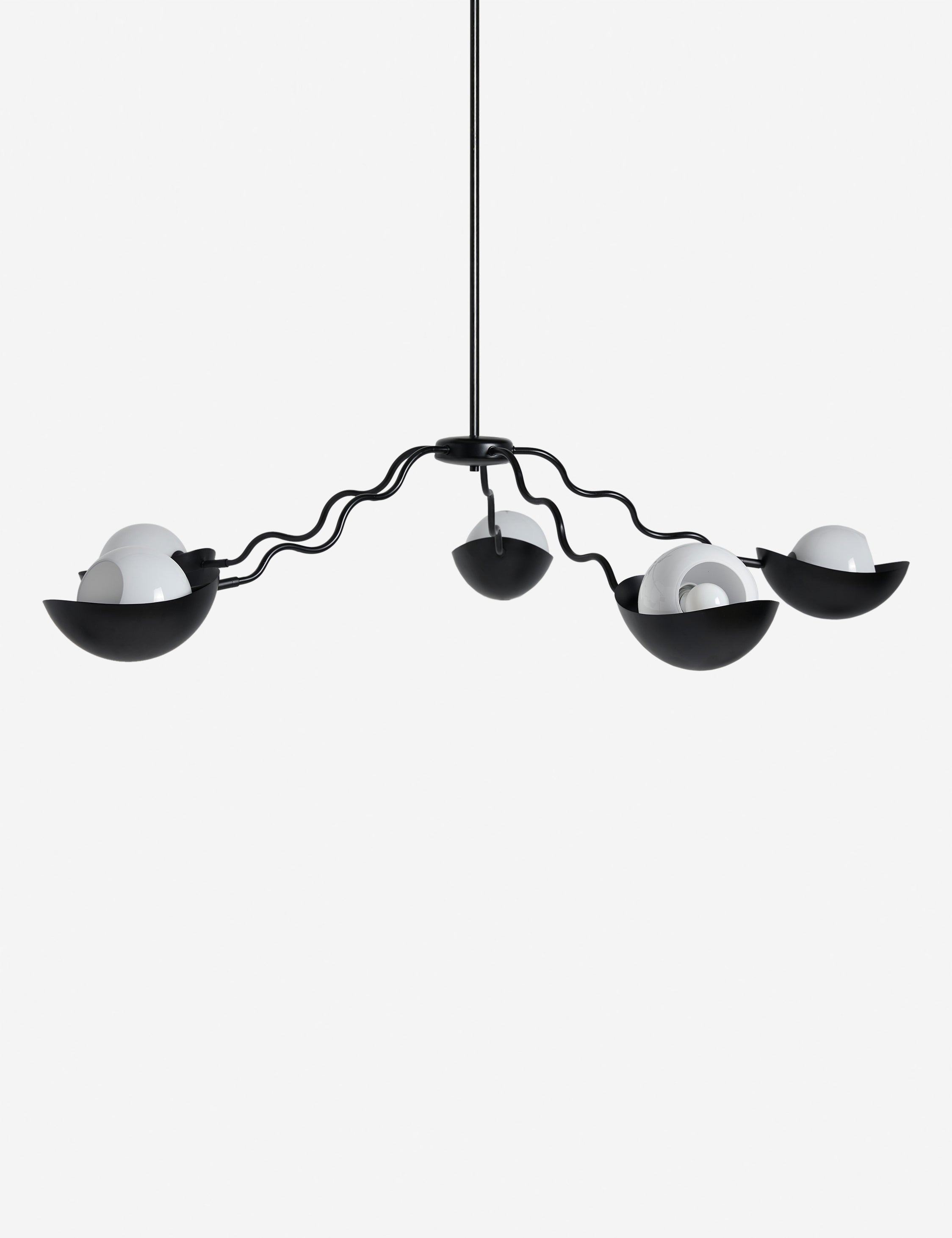 Side view of the Kukka large modern wavy arm chandelier in bronze