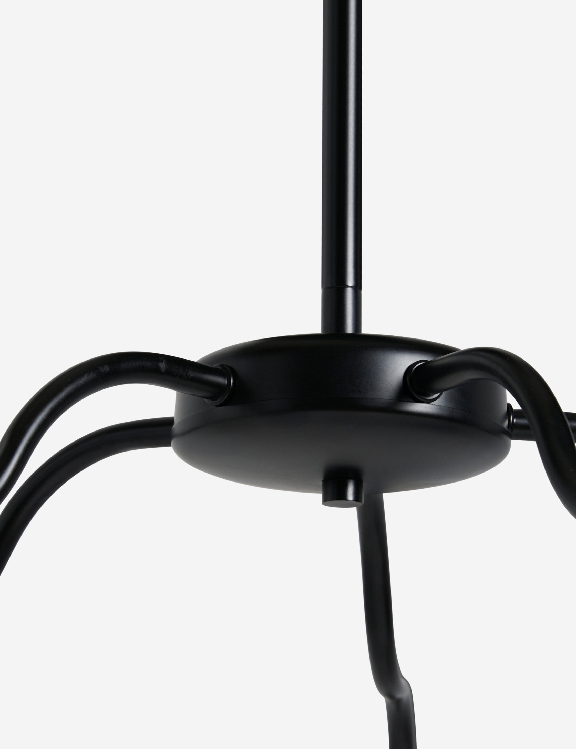Close up view of the Kukka large modern wavy arm chandelier in bronze