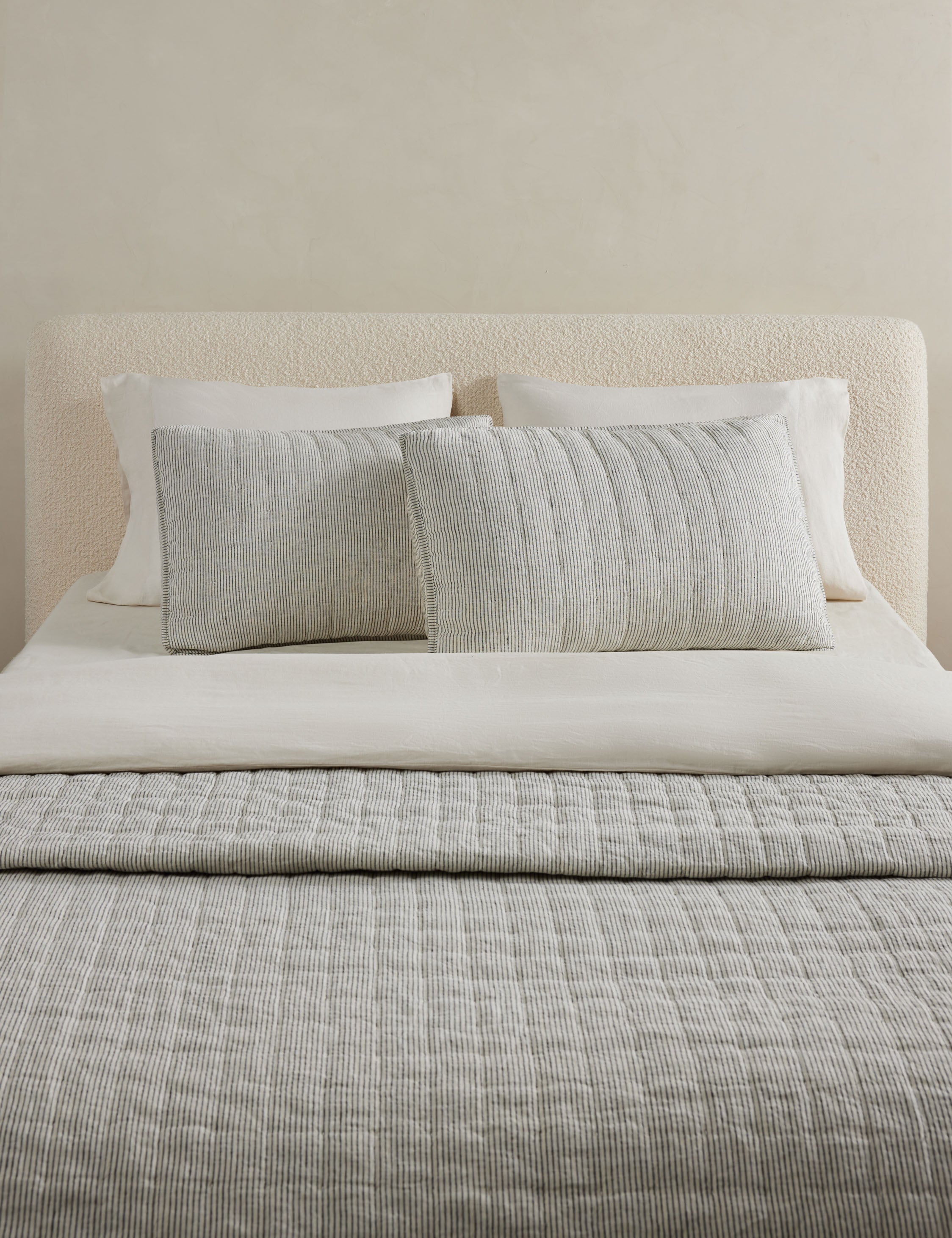 Lammin striped quilted linen coverlet in black and ivory