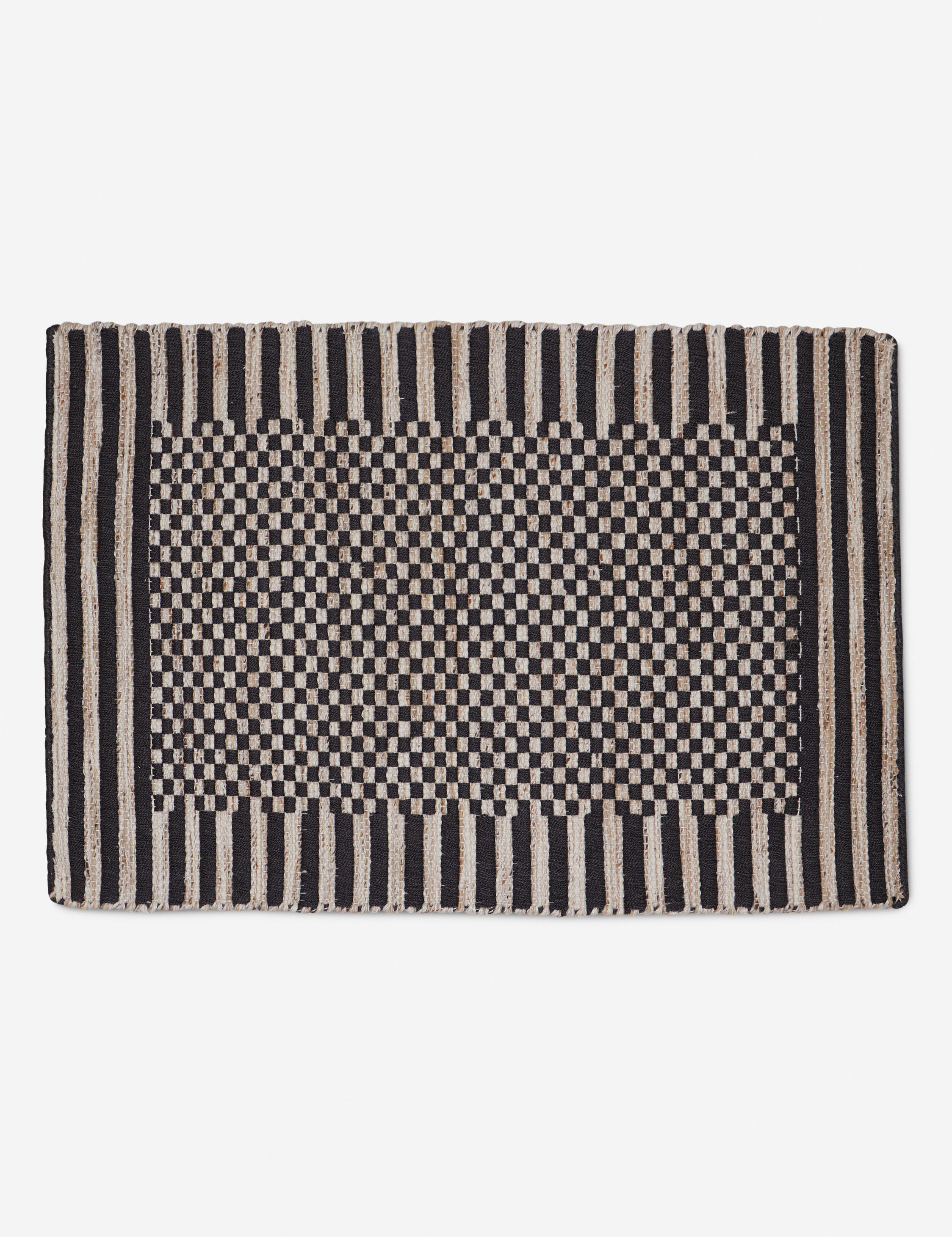 Small Lavinia handwoven high contrast outdoor rug.