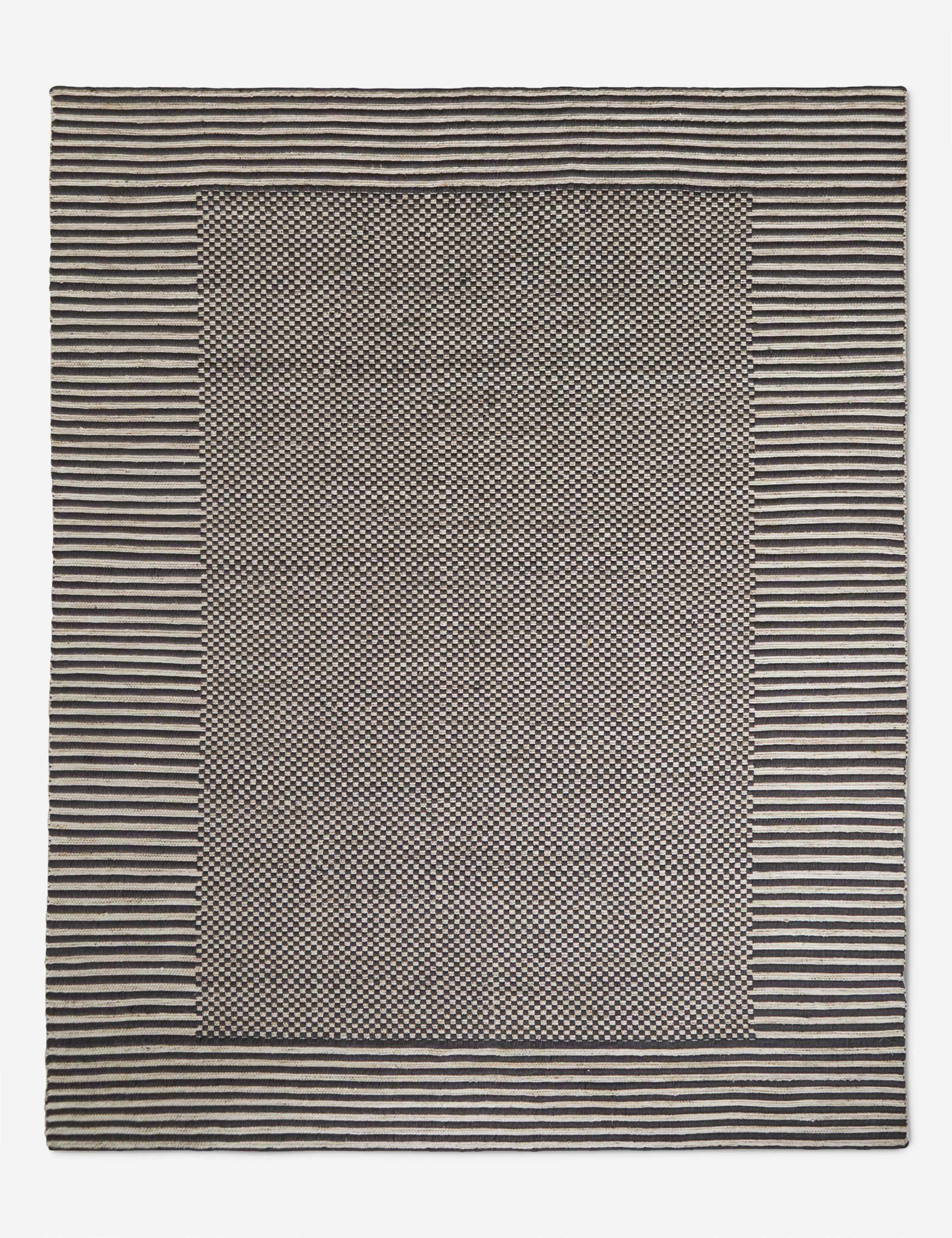 Lavinia handwoven high contrast outdoor rug.