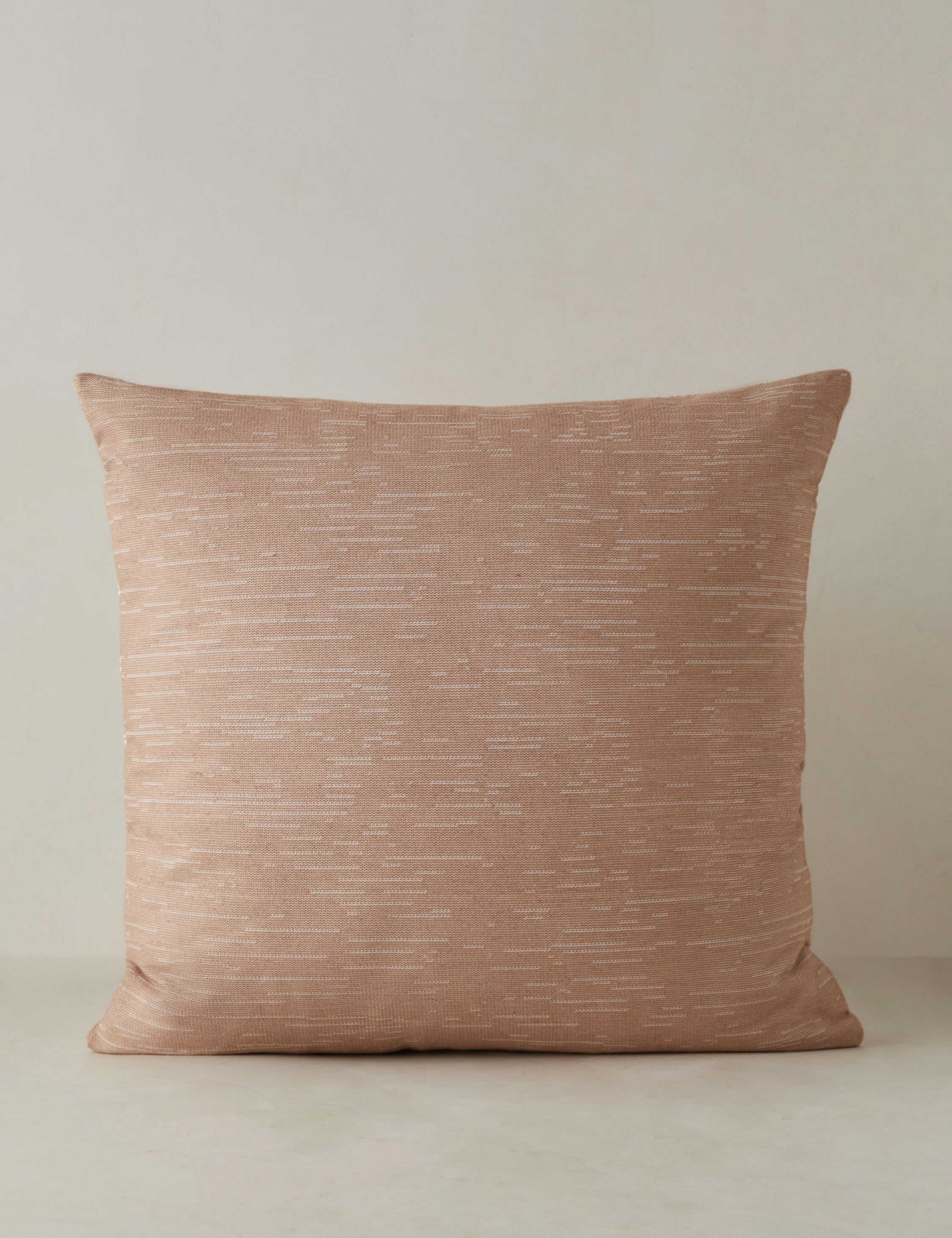 Back of the Leighton broken stripe throw pillow in terracotta.
