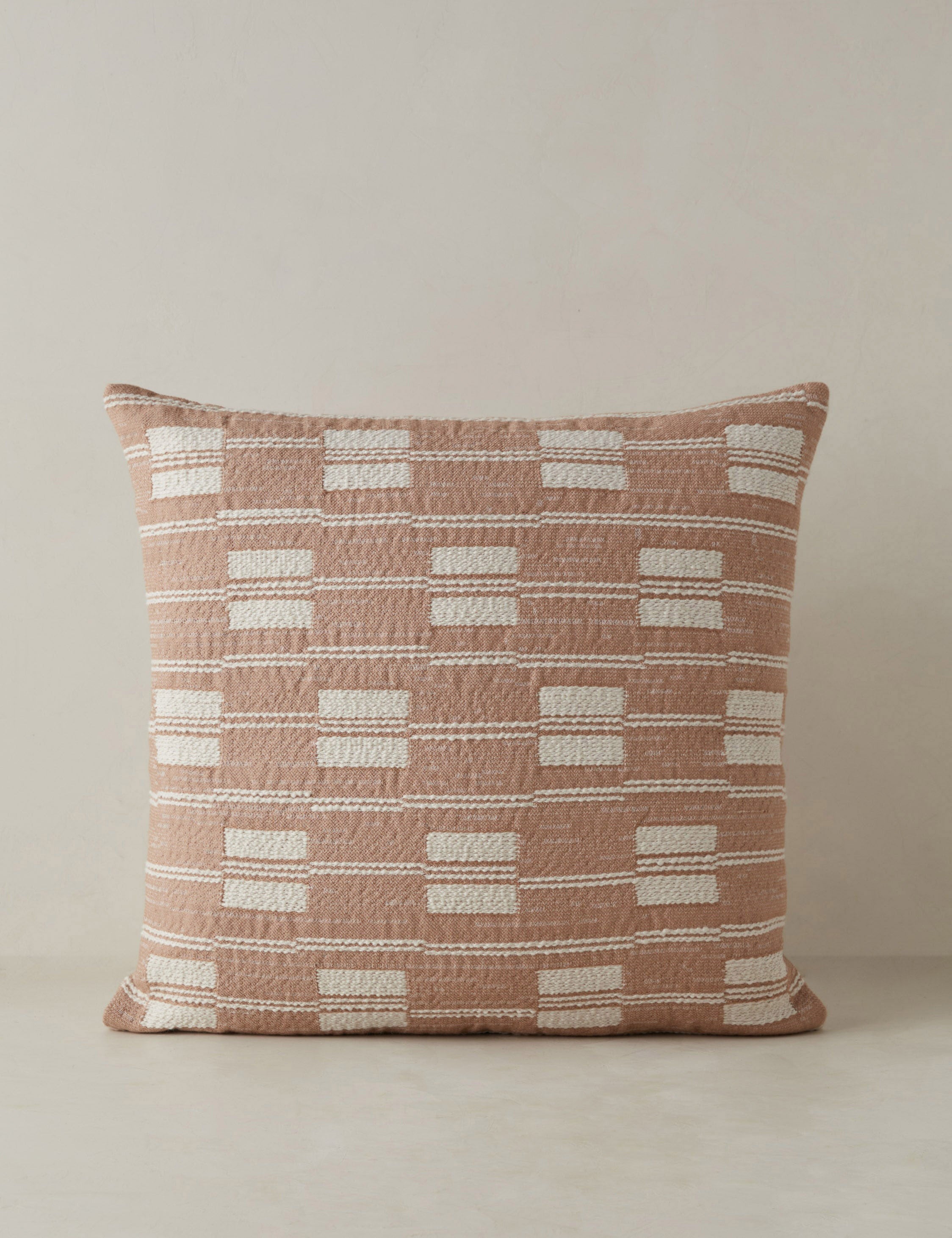 Leighton broken stripe throw pillow in terracotta.