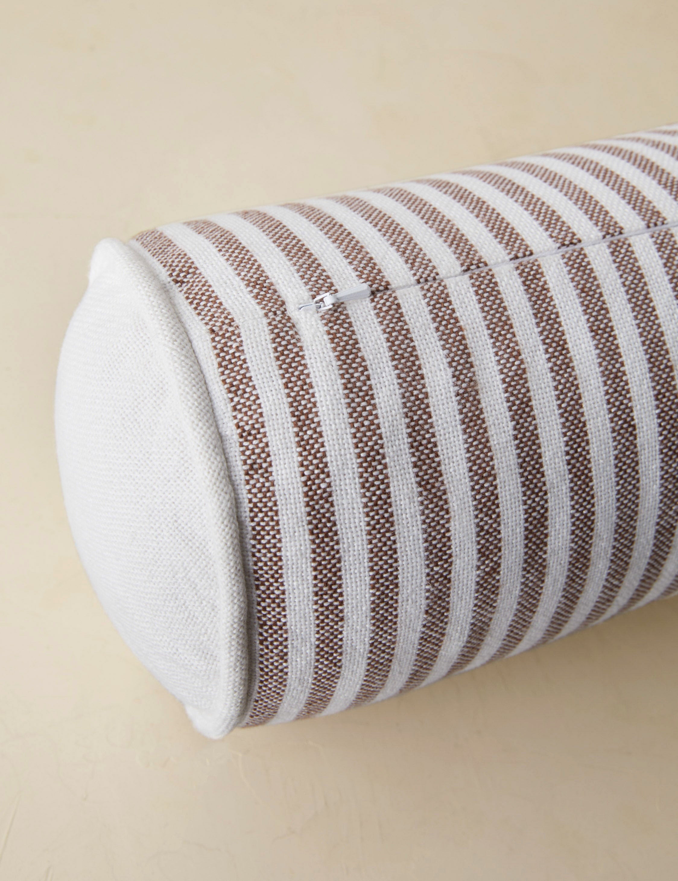 Littu Indoor / Outdoor Striped Bolster Pillow by Sarah Sherman Samuel in Brown