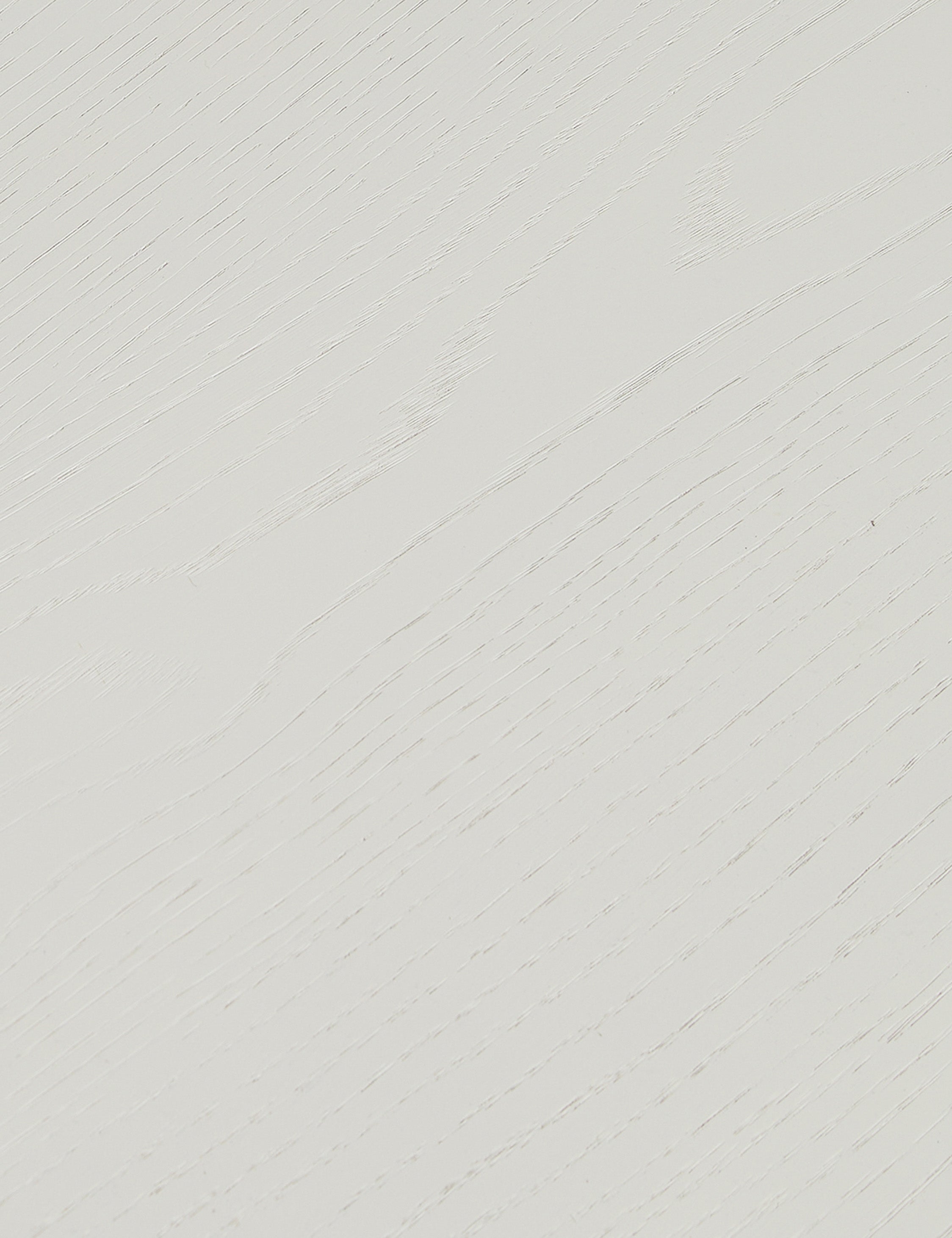 Close up of the finish of the Lowen double pedestal base white washed dining table.