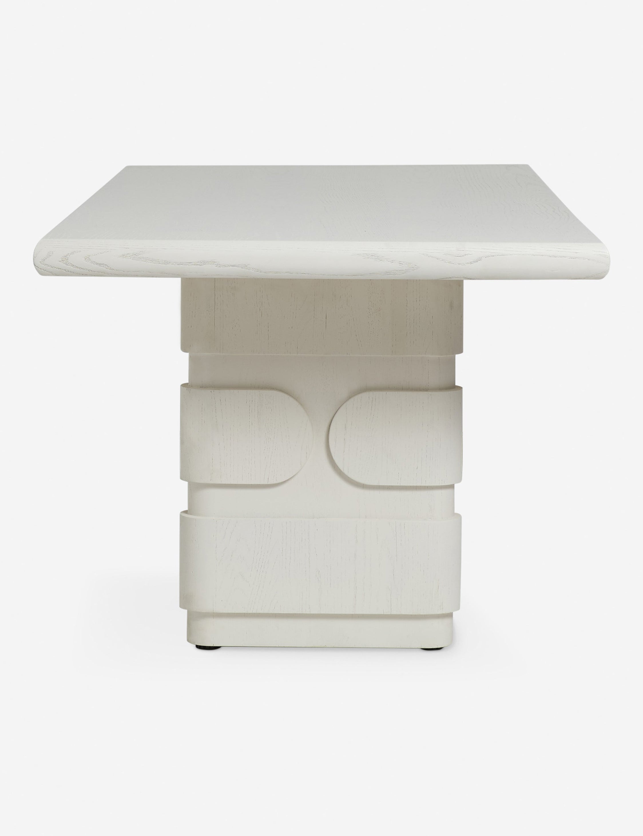 Side profile of the Lowen double pedestal base white washed dining table.
