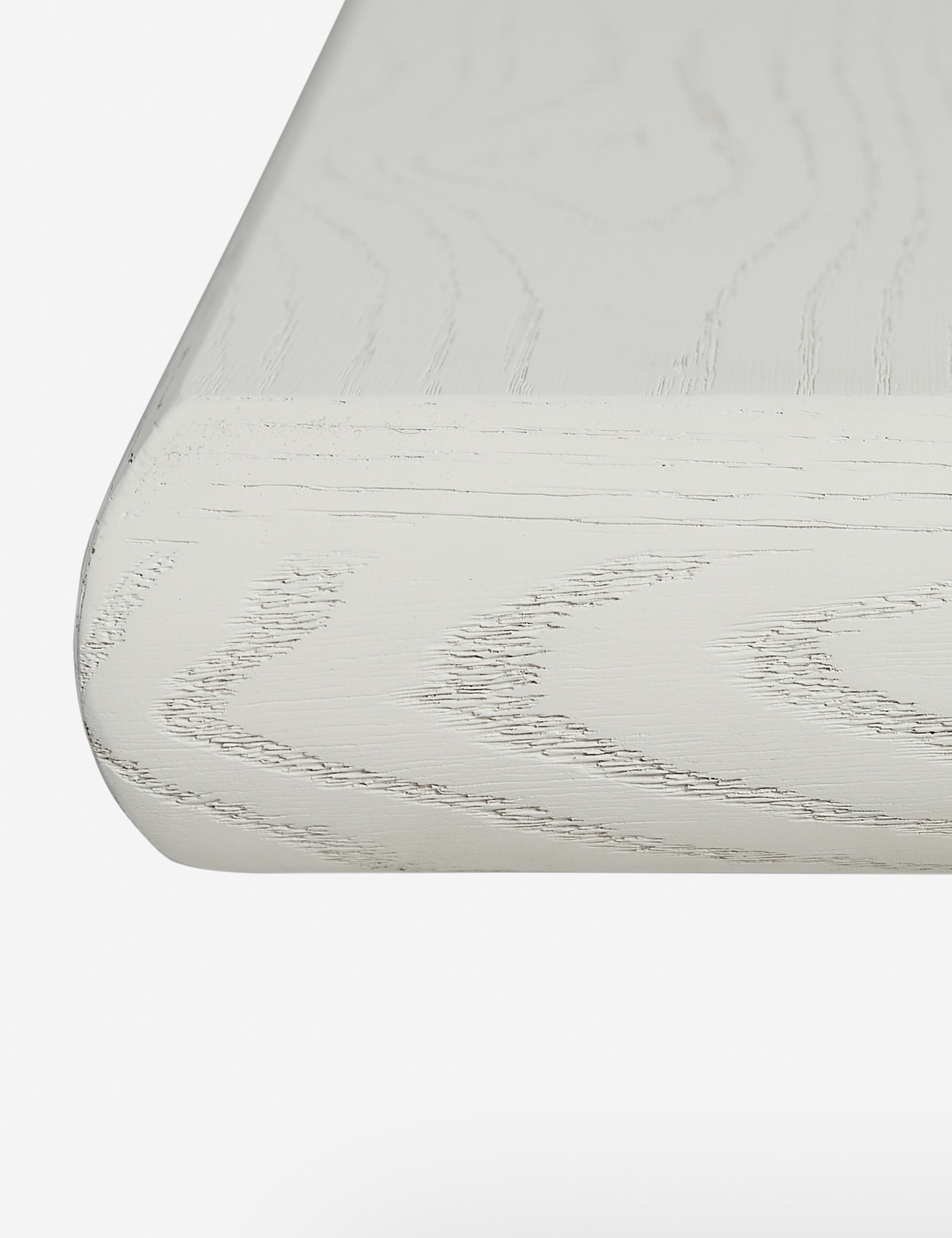 Close up of the Lowen double pedestal base white washed dining table.