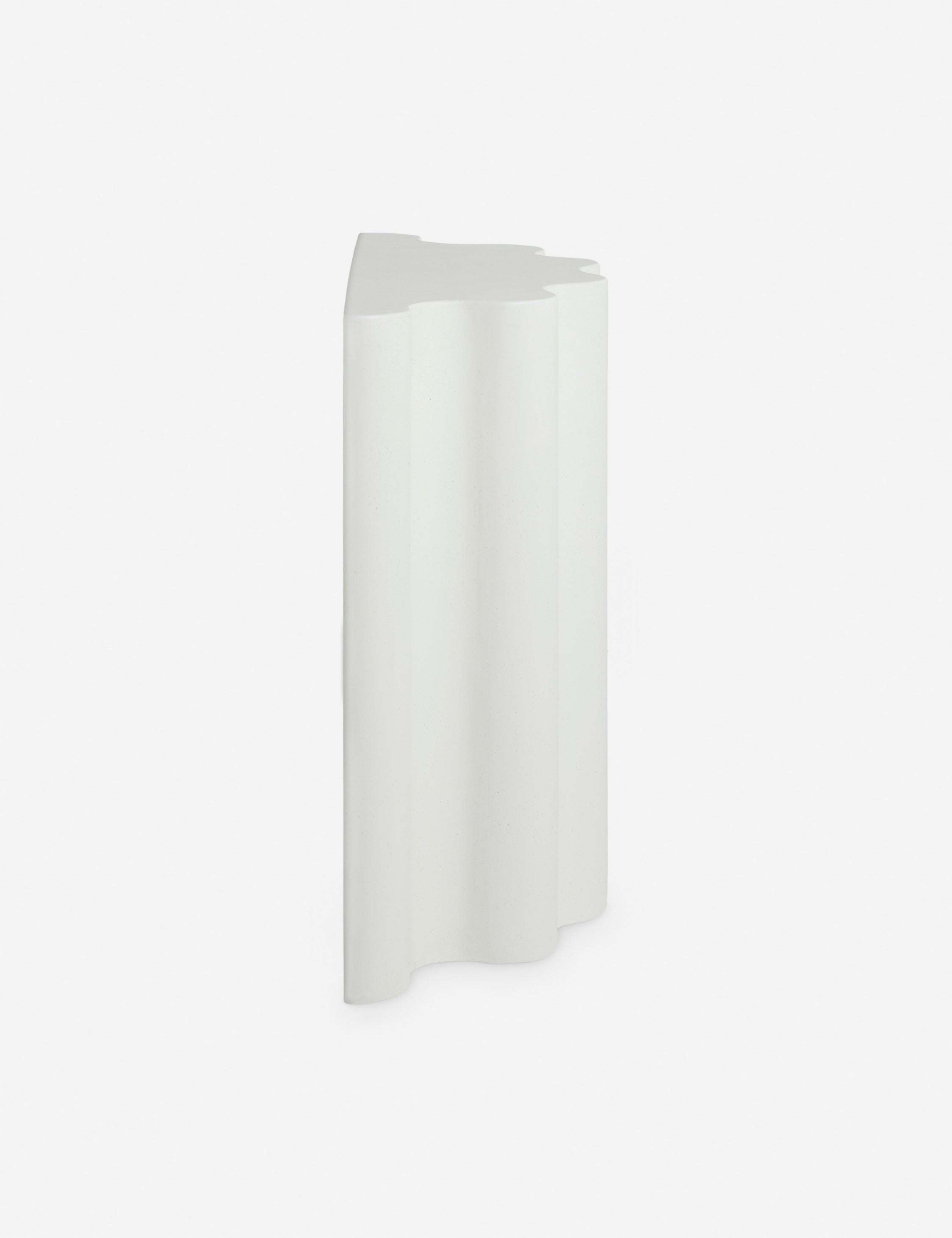 Side view of the Lune half-moon, scalloped concrete console table