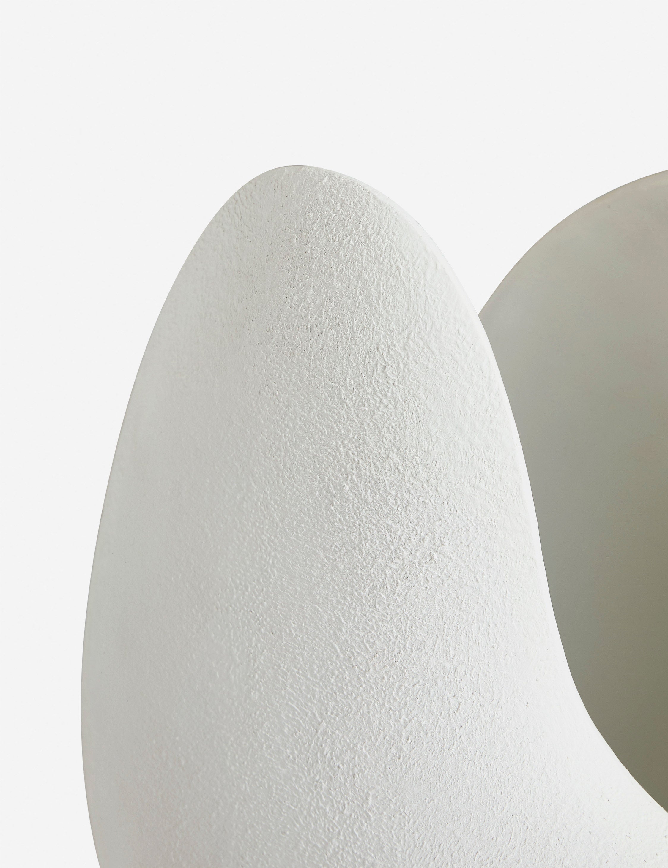 Close up view of the Soft Petal matte white floral silhouette table lamp