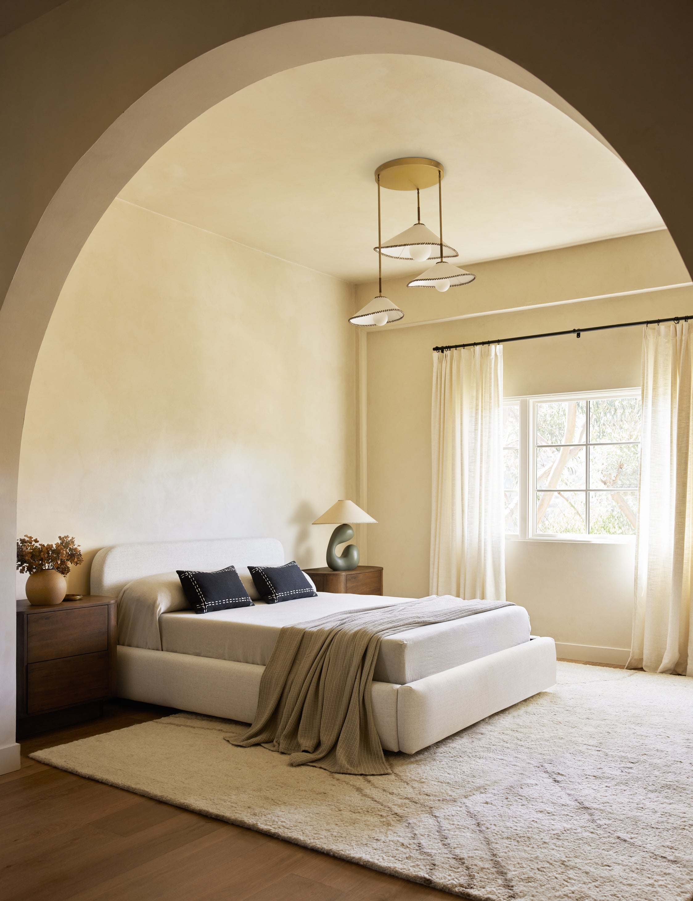 Currents Hand Knotted Wool Rug by Elan Byrd used in a bedroom.